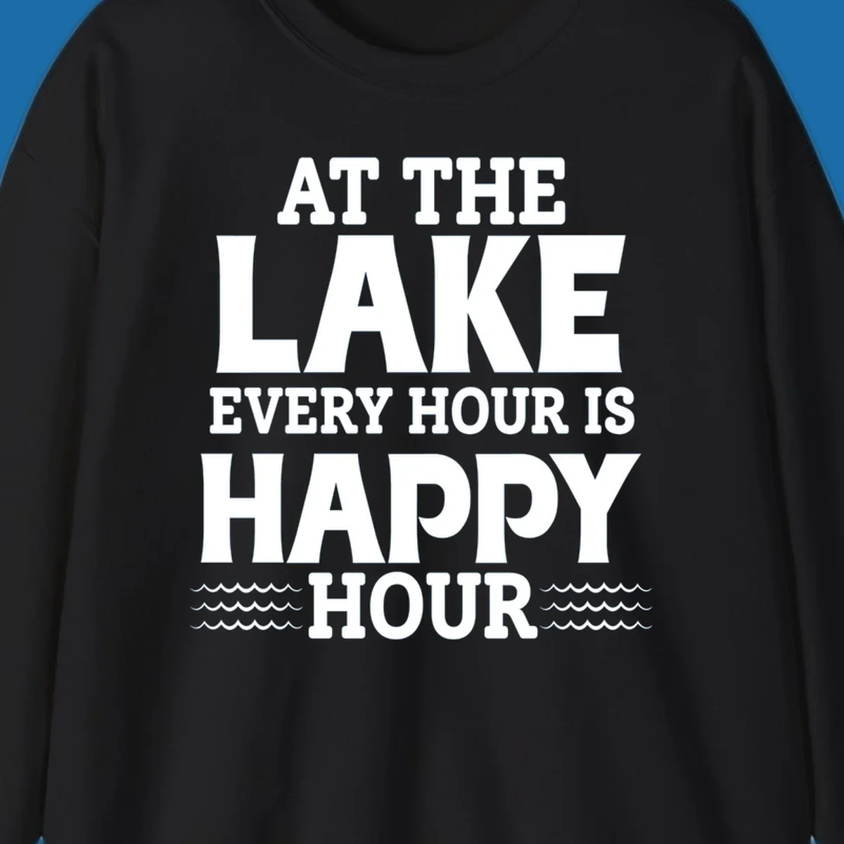 Text design 'At The Lake Every Hour Is Happy Hour' with wave accents, for lake-happy-hour apparel.