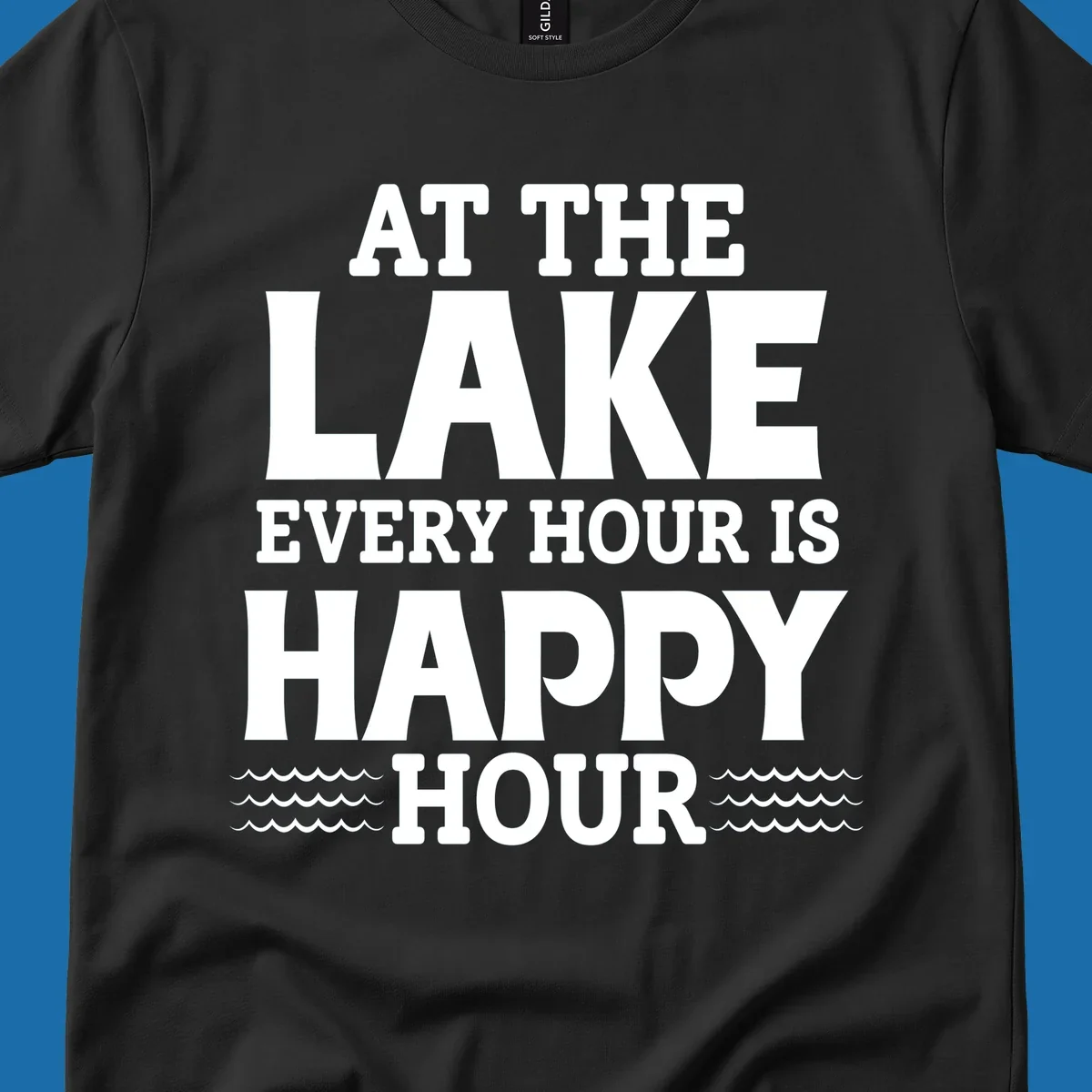Text design 'At The Lake Every Hour Is Happy Hour' with wave accents, for lake-happy-hour apparel.