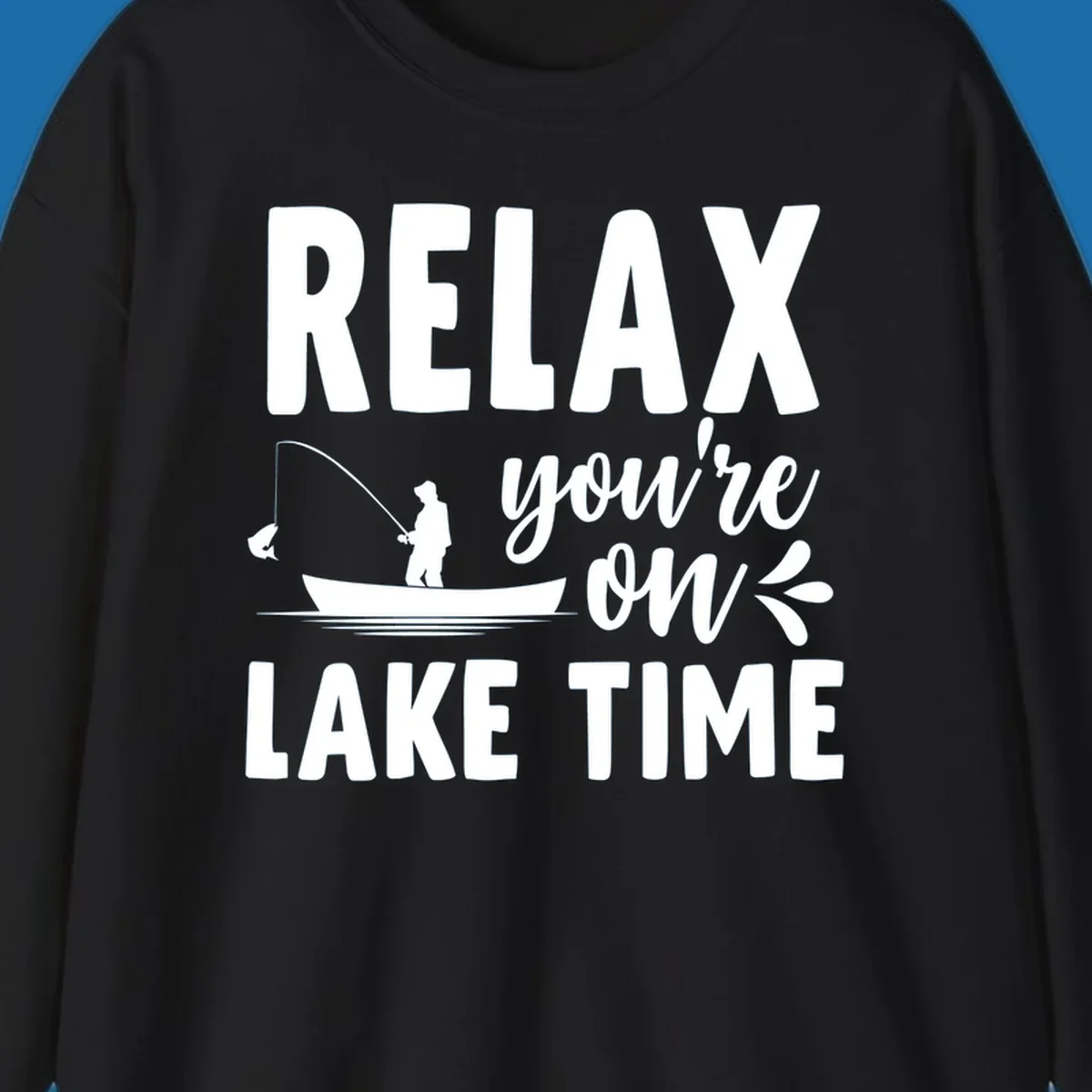 Relax you're on lake time fishing graphic with fisherman in boat catching fish.