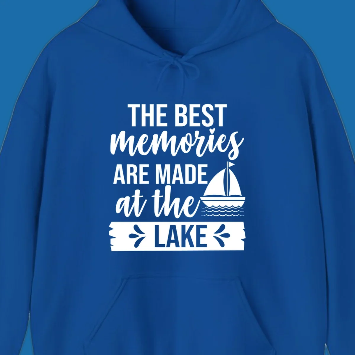The Best Memories Are Made At The Lake text with sailboat graphic