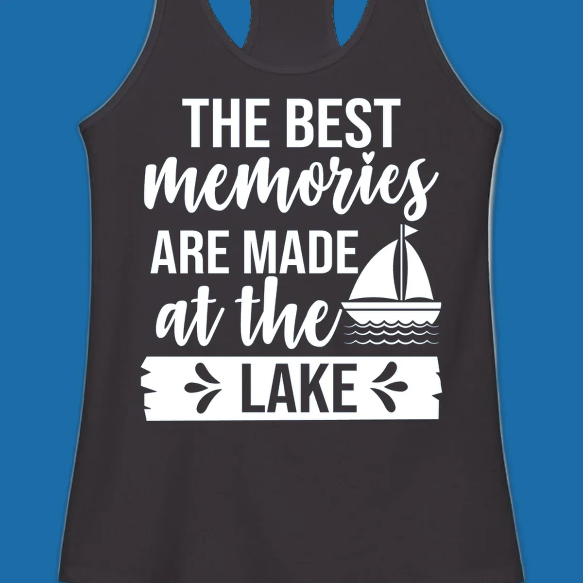 The Best Memories Are Made At The Lake text with sailboat graphic