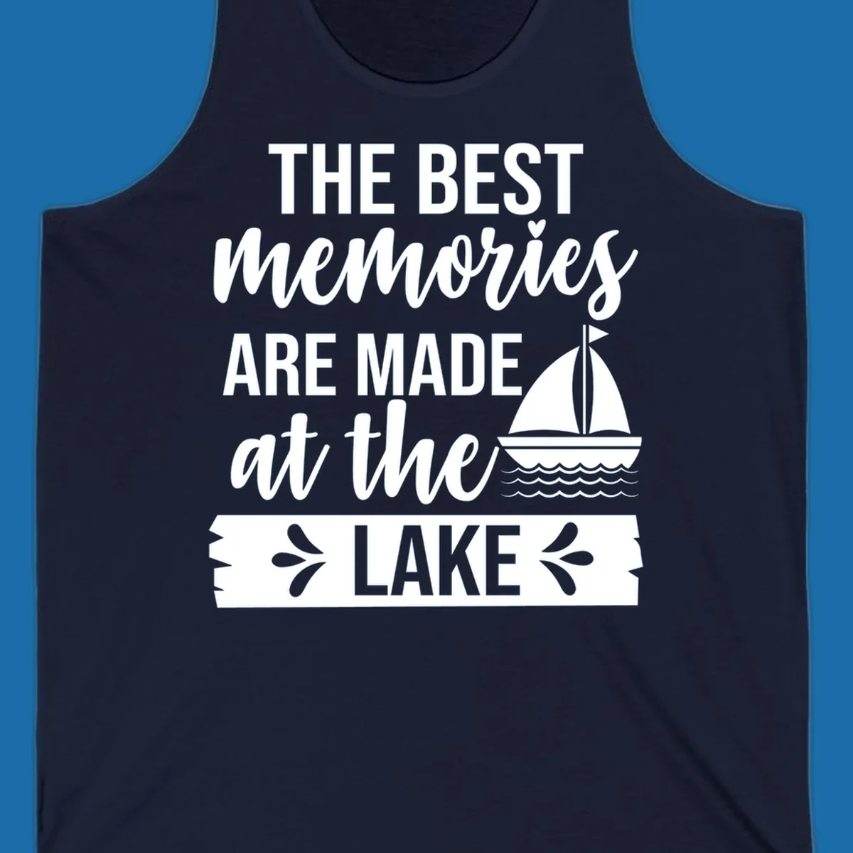 The Best Memories Are Made At The Lake text with sailboat graphic