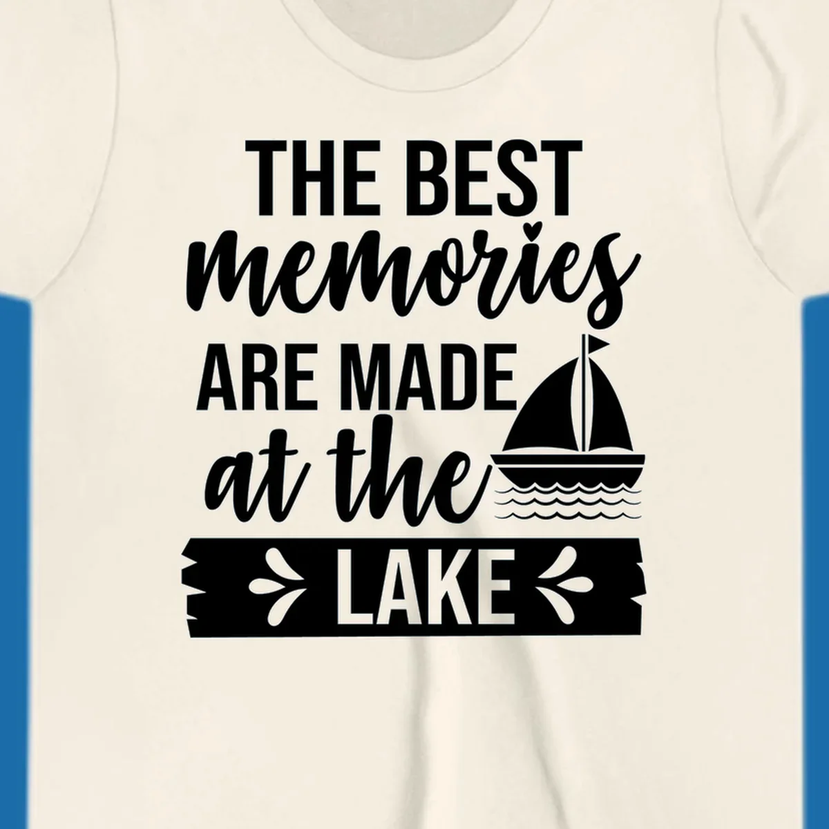 The Best Memories Are Made At The Lake text with sailboat graphic