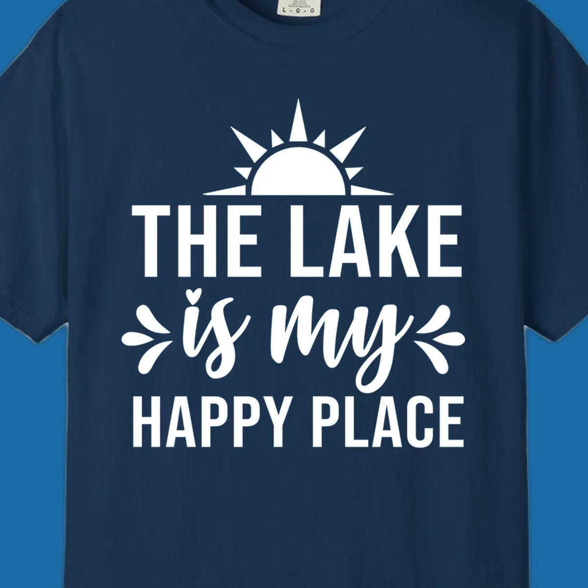 The Lake Is My Happy Place typography design with sun graphic.