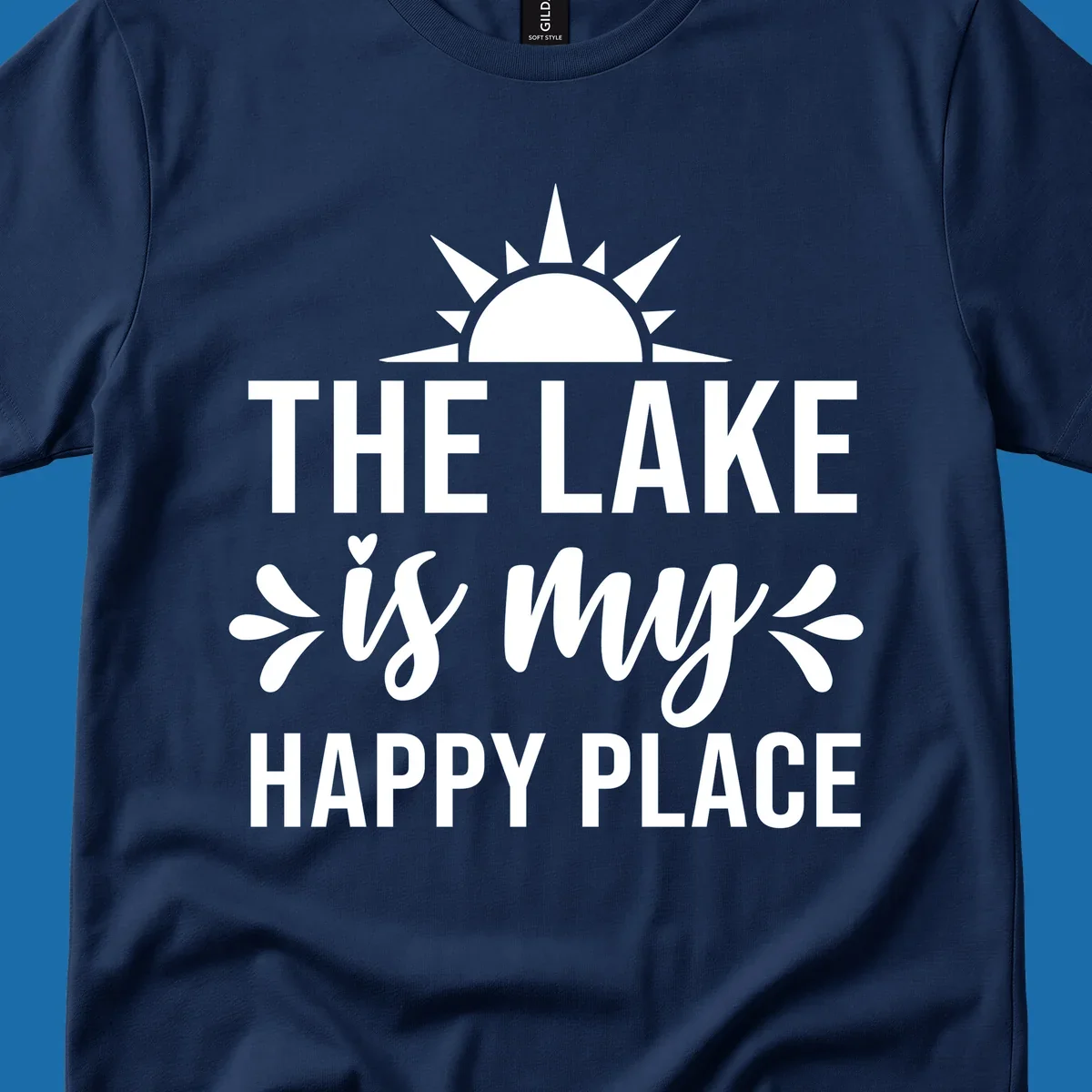 The Lake Is My Happy Place typography design with sun graphic.