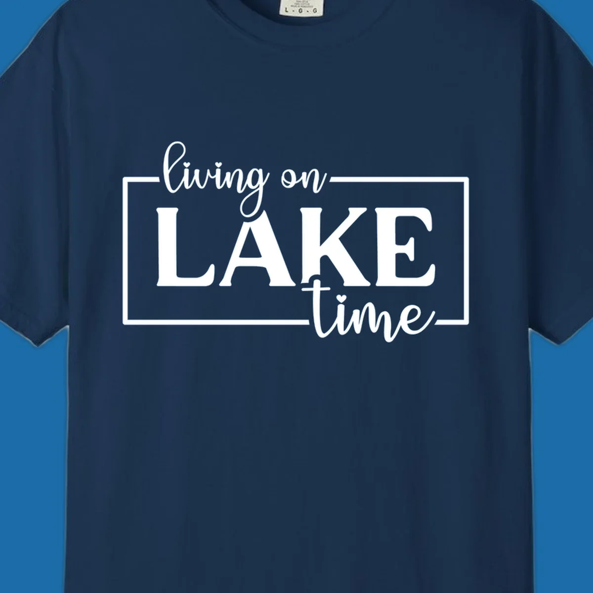 Living on lake time text design with script and bold fonts, inside a rectangle.