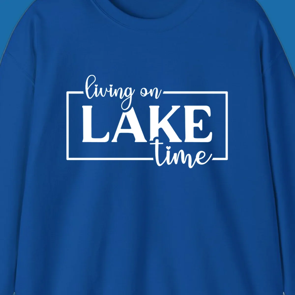 Living on lake time text design with script and bold fonts, inside a rectangle.