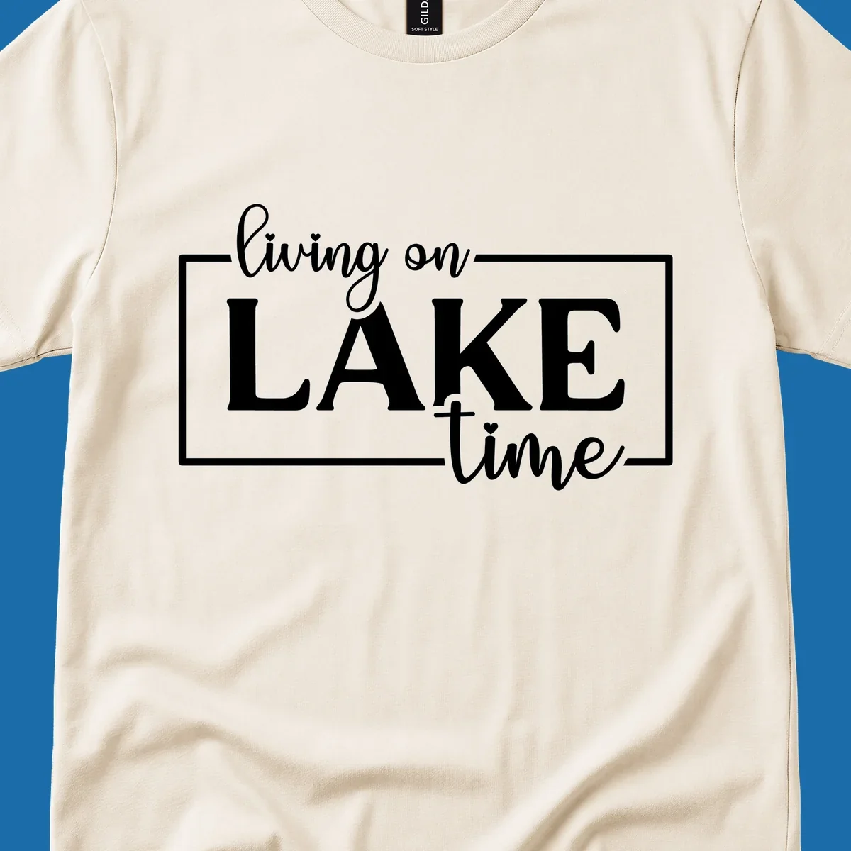 Living on lake time text design with script and bold fonts, inside a rectangle.