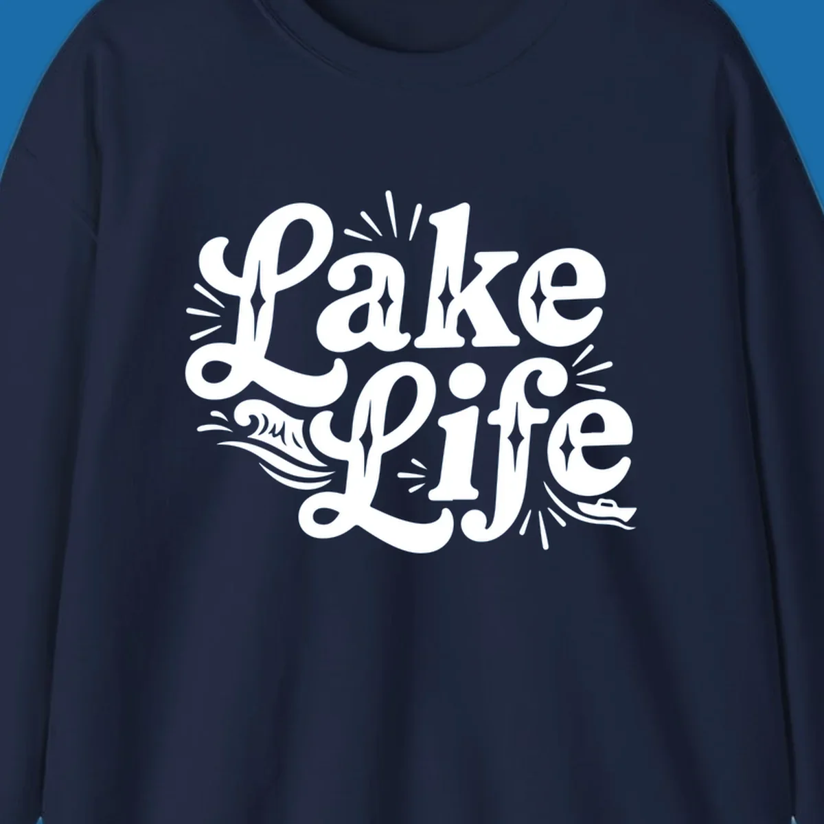 Retro typography design with "Lake Life", waves, and a boat, for lake-themed apparel.