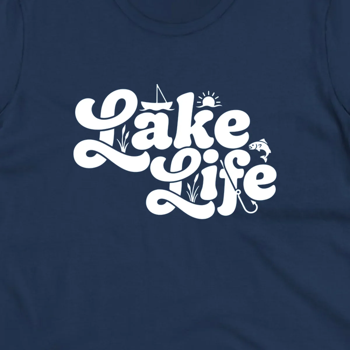 Retro Lake Life script design featuring a sailboat, sun, fish, and fishing hook.