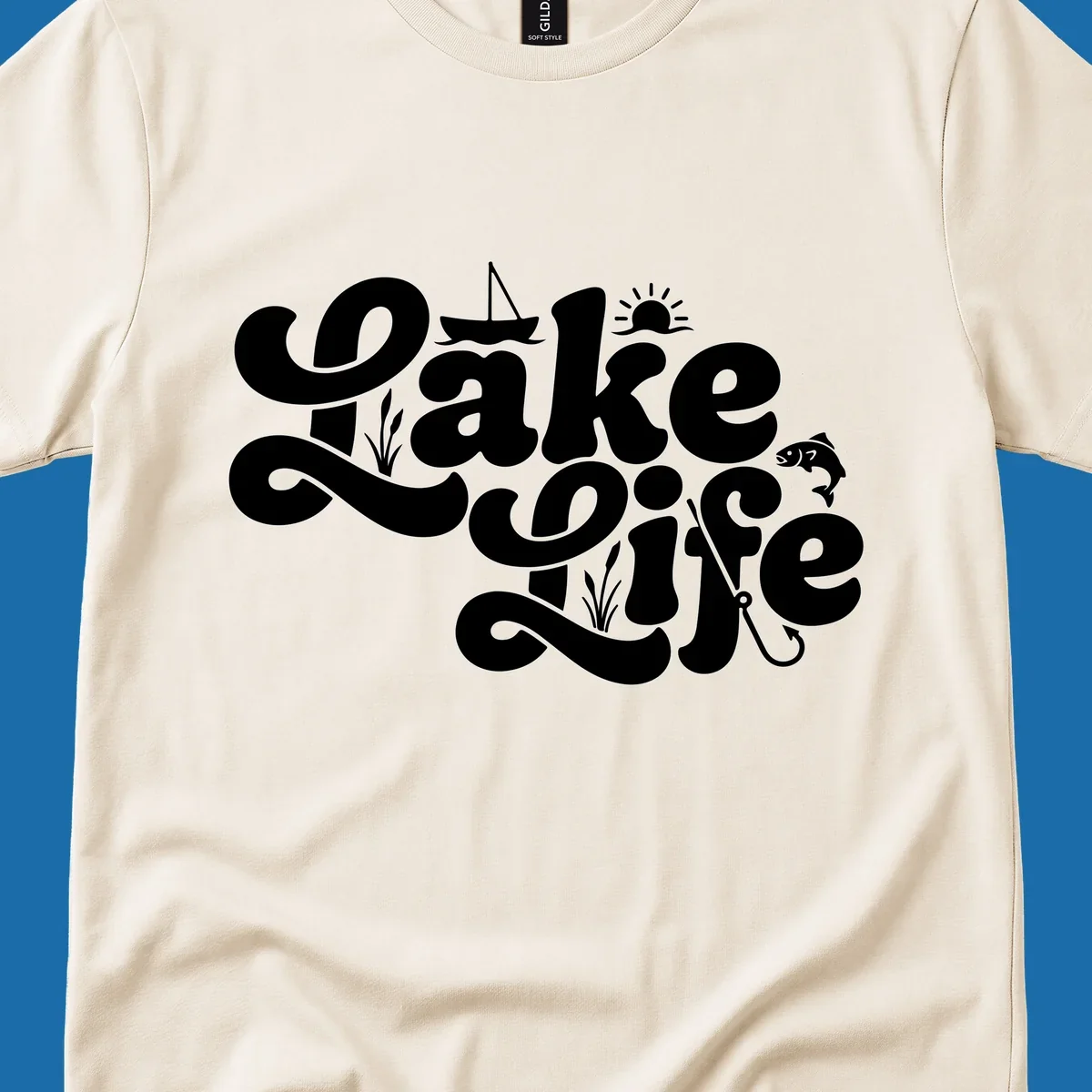 Retro Lake Life script design featuring a sailboat, sun, fish, and fishing hook.