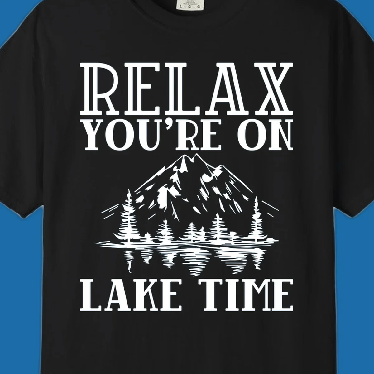 Relax You're On Lake Time text with mountains, trees, and lake reflection.