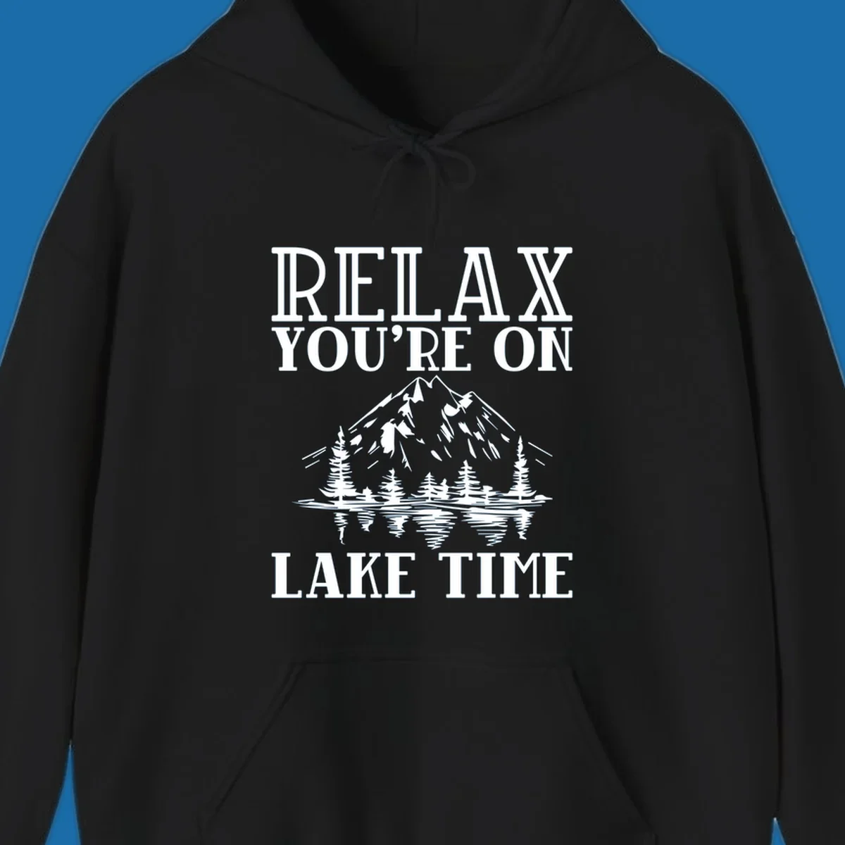 Relax You're On Lake Time text with mountains, trees, and lake reflection.