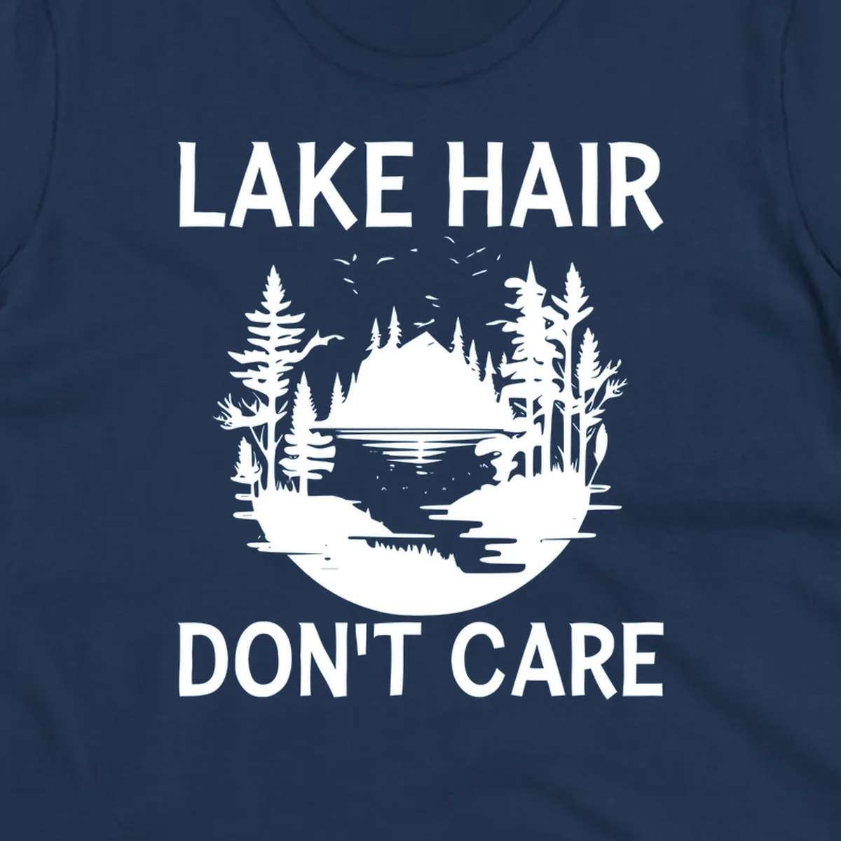 Lake Hair Don't Care design featuring a silhouette of a lake, trees, and mountains.