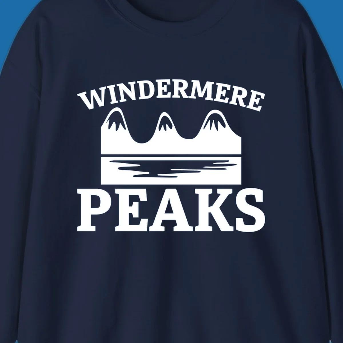 Windermere Peaks mountain and lake graphic with text.