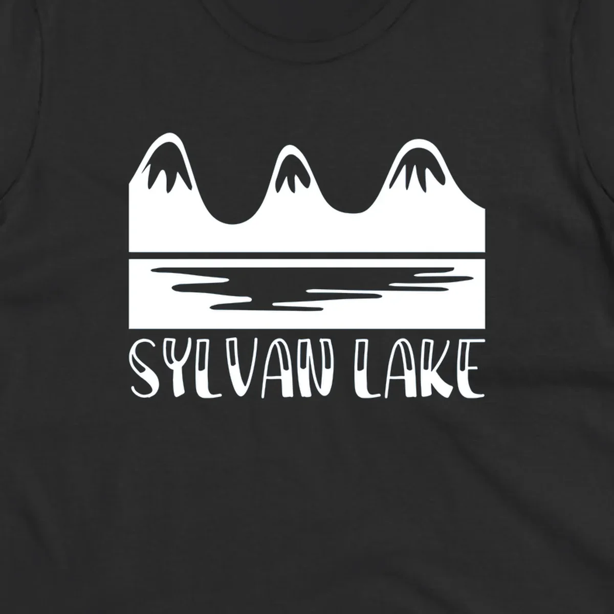 Sylvan Lake mountains reflected in water, with text 'SYLVAN LAKE'.