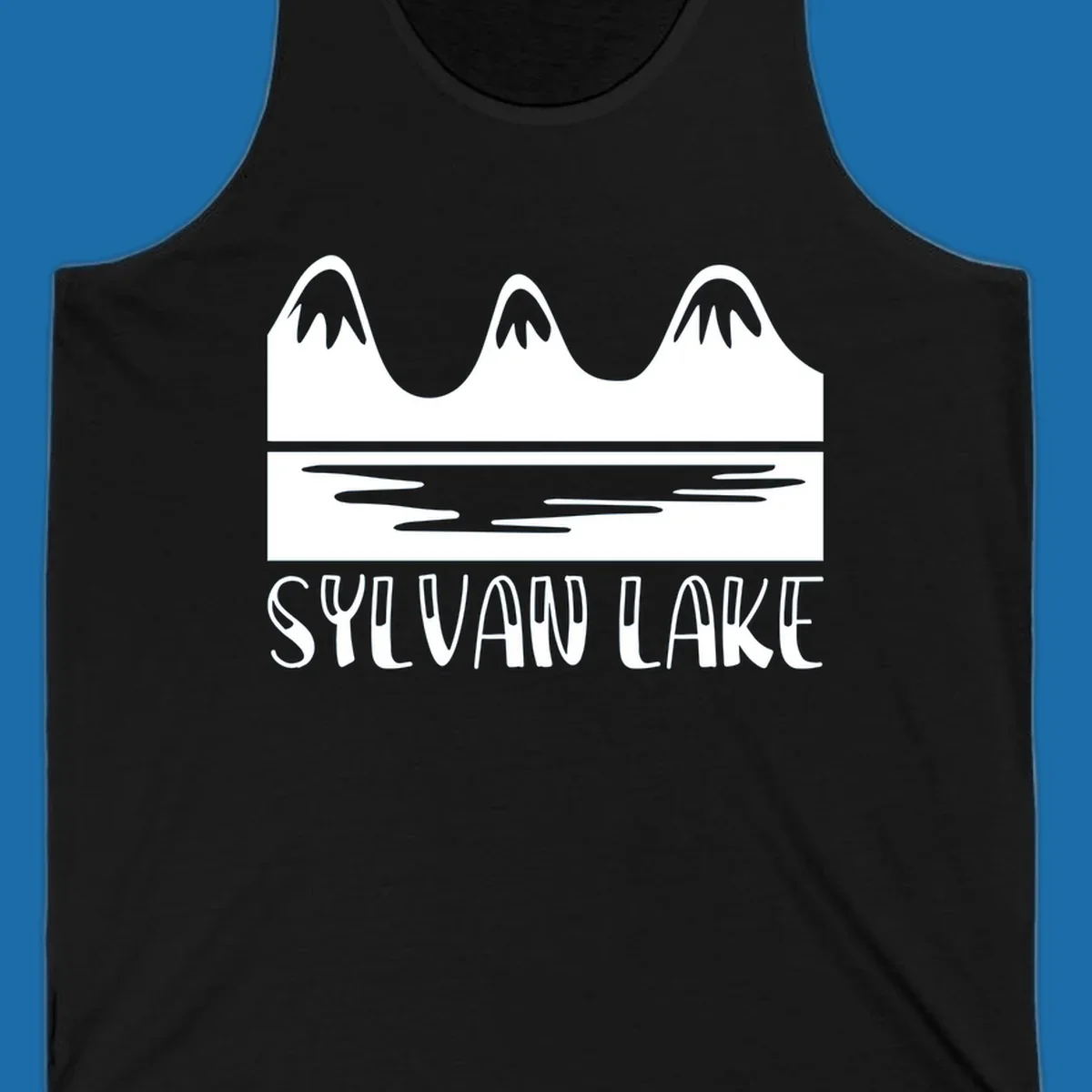 Sylvan Lake mountains reflected in water, with text 'SYLVAN LAKE'.