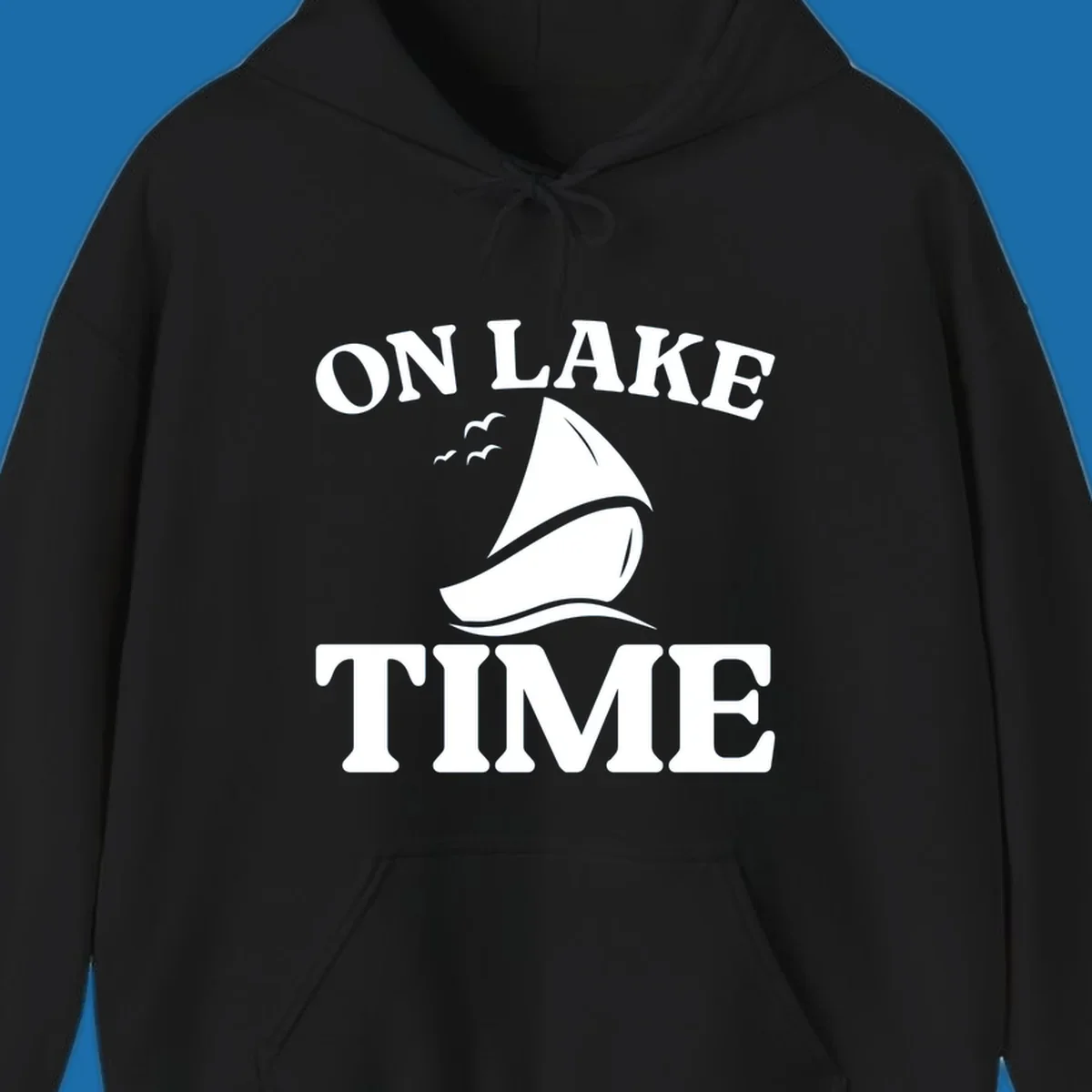 On lake time sailboat graphic with birds and waves.