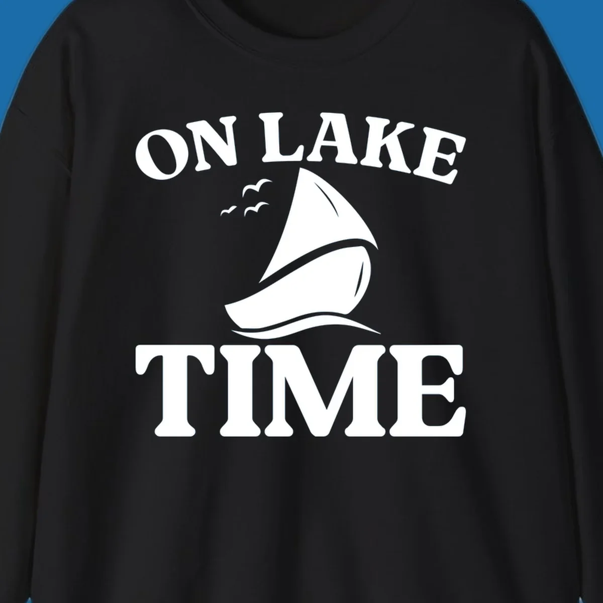 On lake time sailboat graphic with birds and waves.