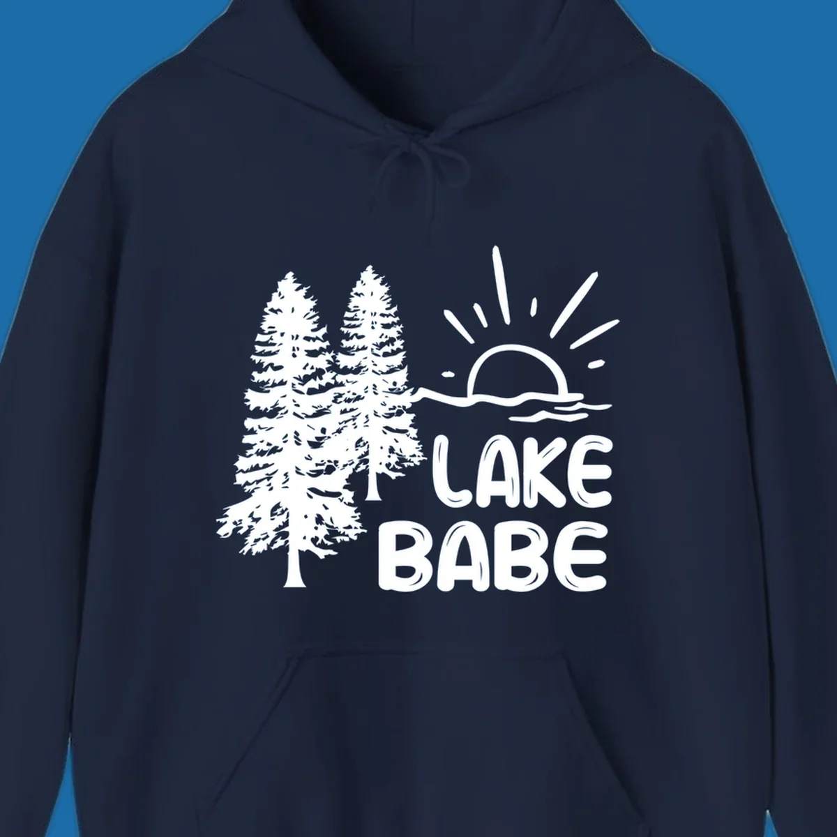 White graphic of pine trees, sun rising over water, and text 'LAKE BABE' on a black background.