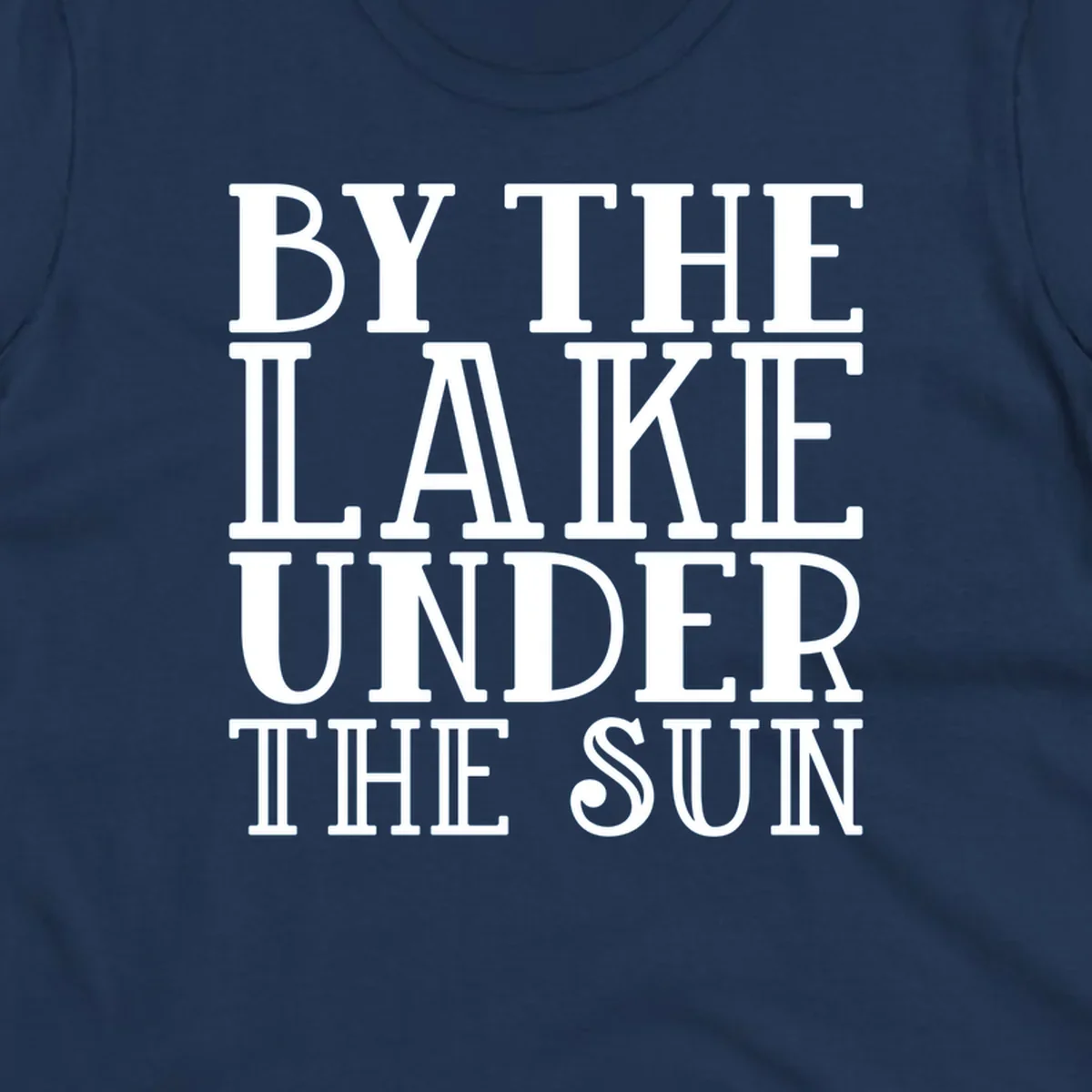Text design 'BY THE LAKE UNDER THE SUN' in white serif font.