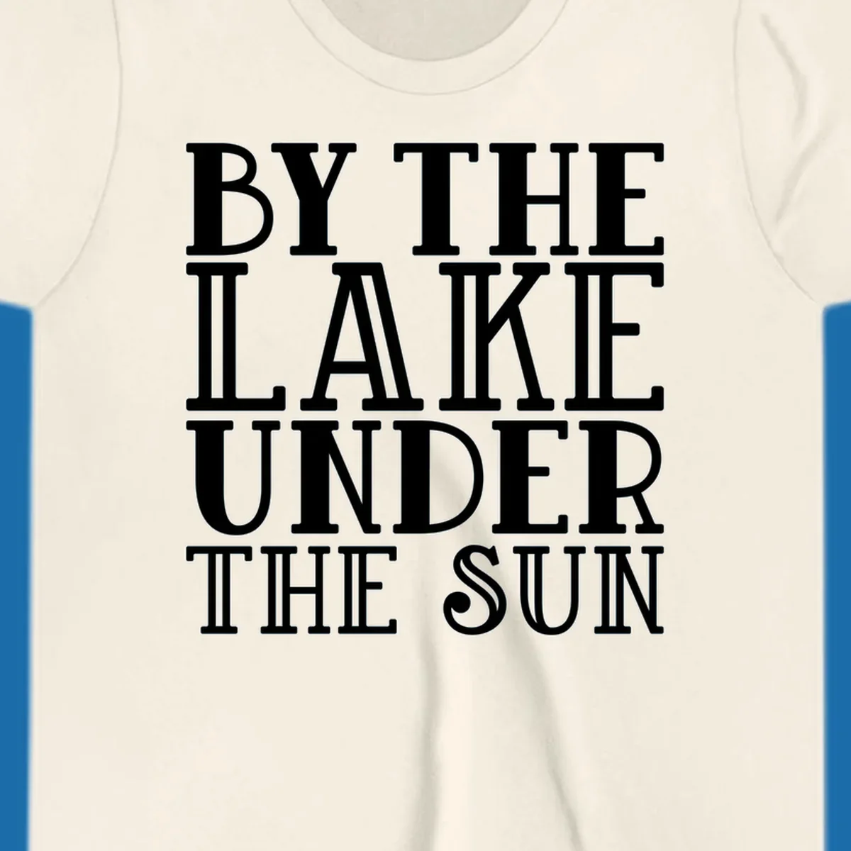 Text design 'BY THE LAKE UNDER THE SUN' in white serif font.