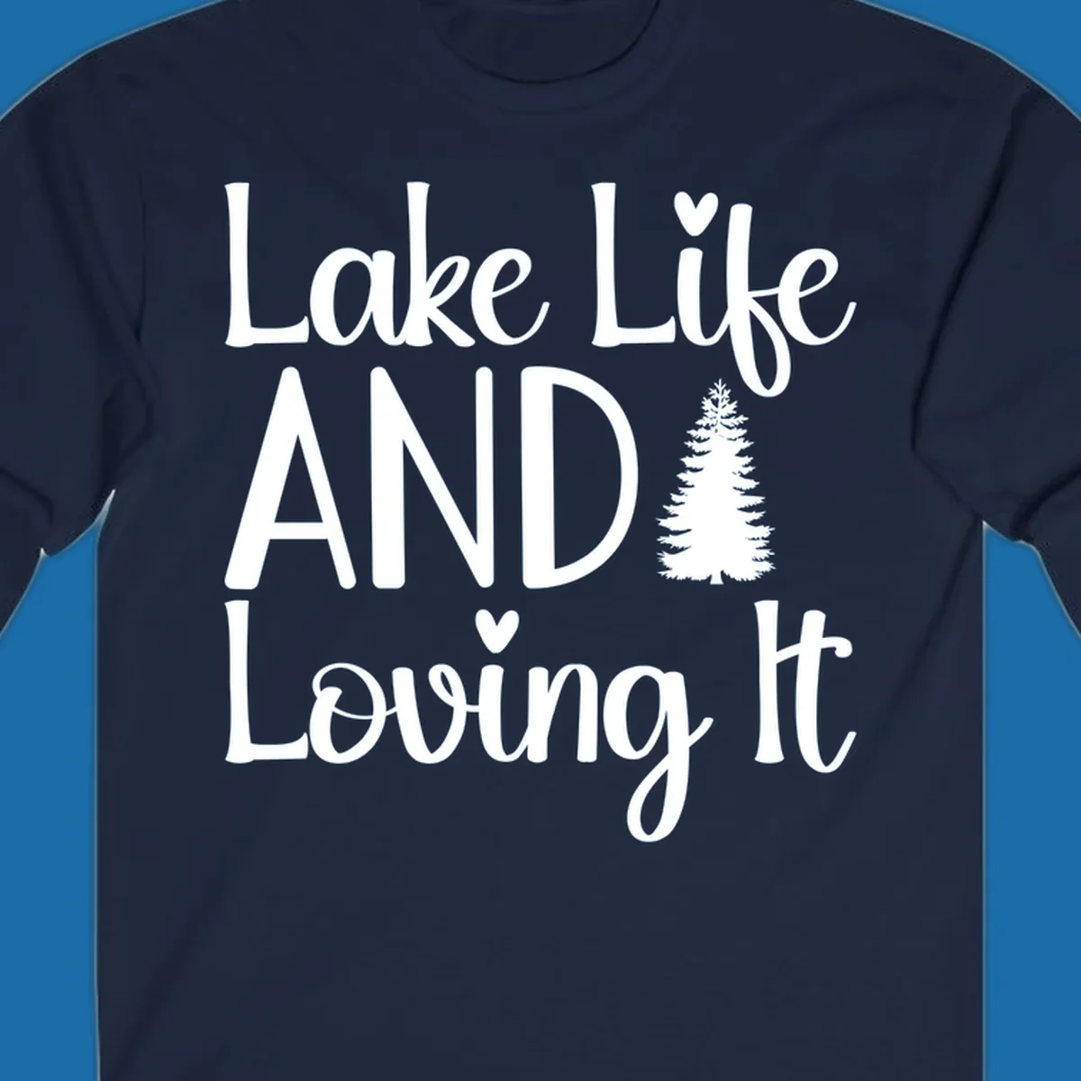 Lake Life And Loving It text with pine tree and heart graphics.