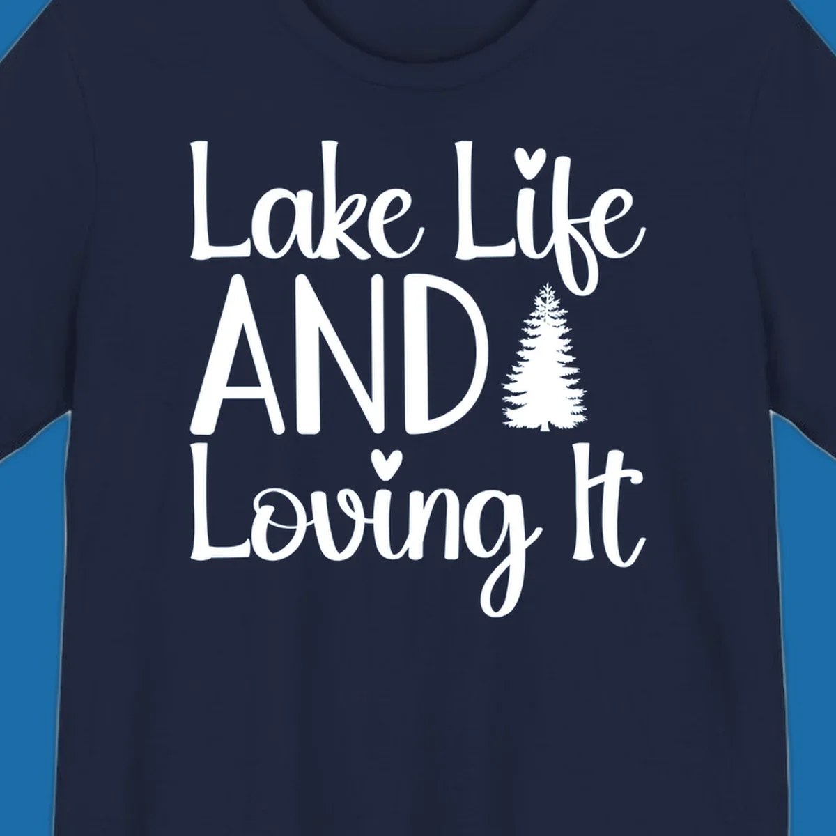 Lake Life And Loving It text with pine tree and heart graphics.