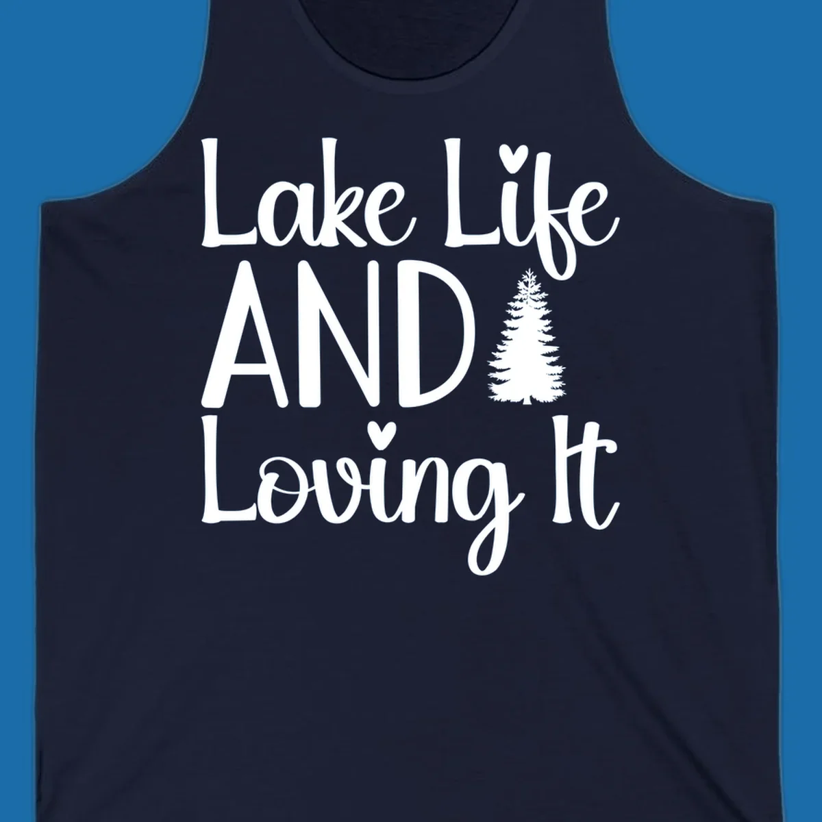 Lake Life And Loving It text with pine tree and heart graphics.