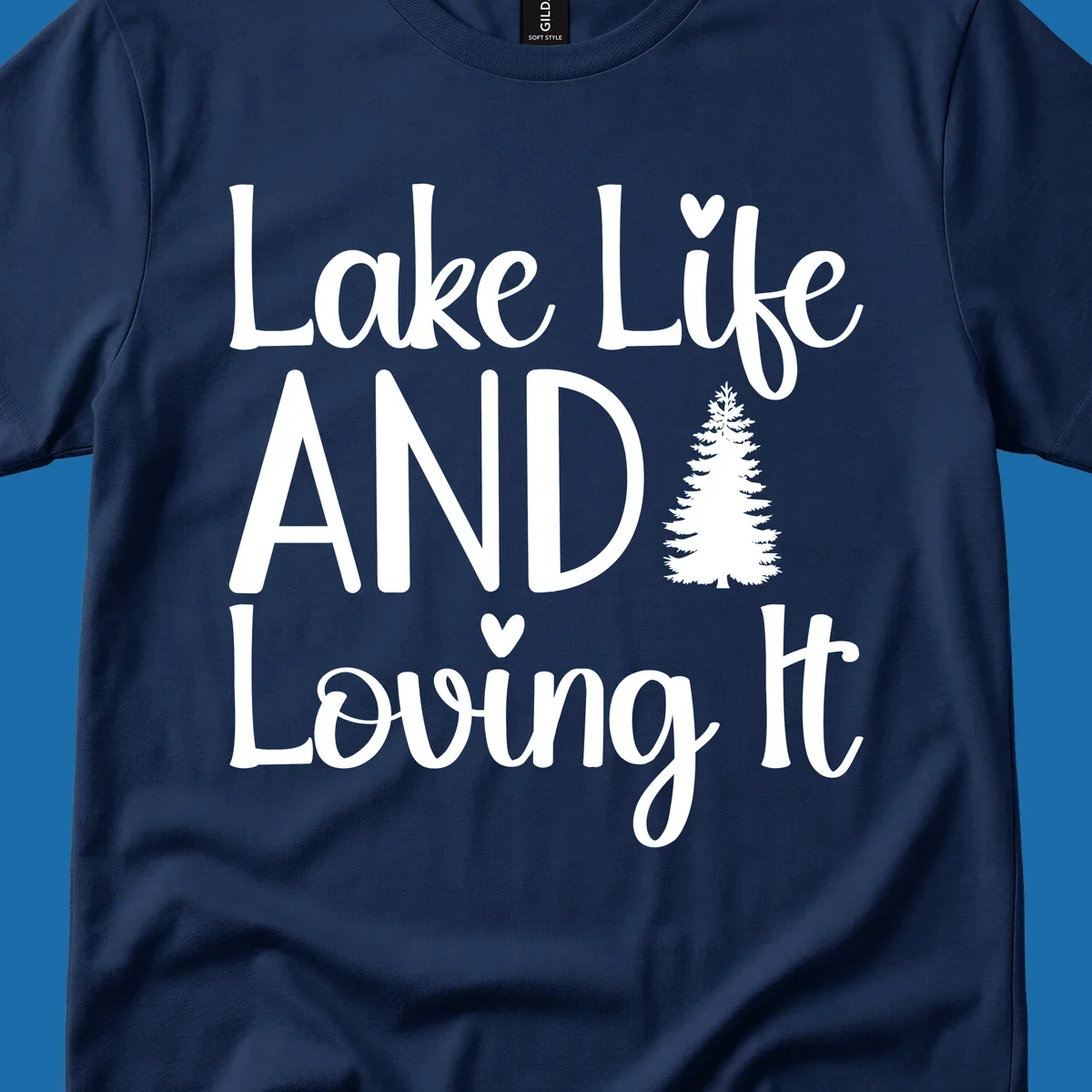 Lake Life And Loving It text with pine tree and heart graphics.