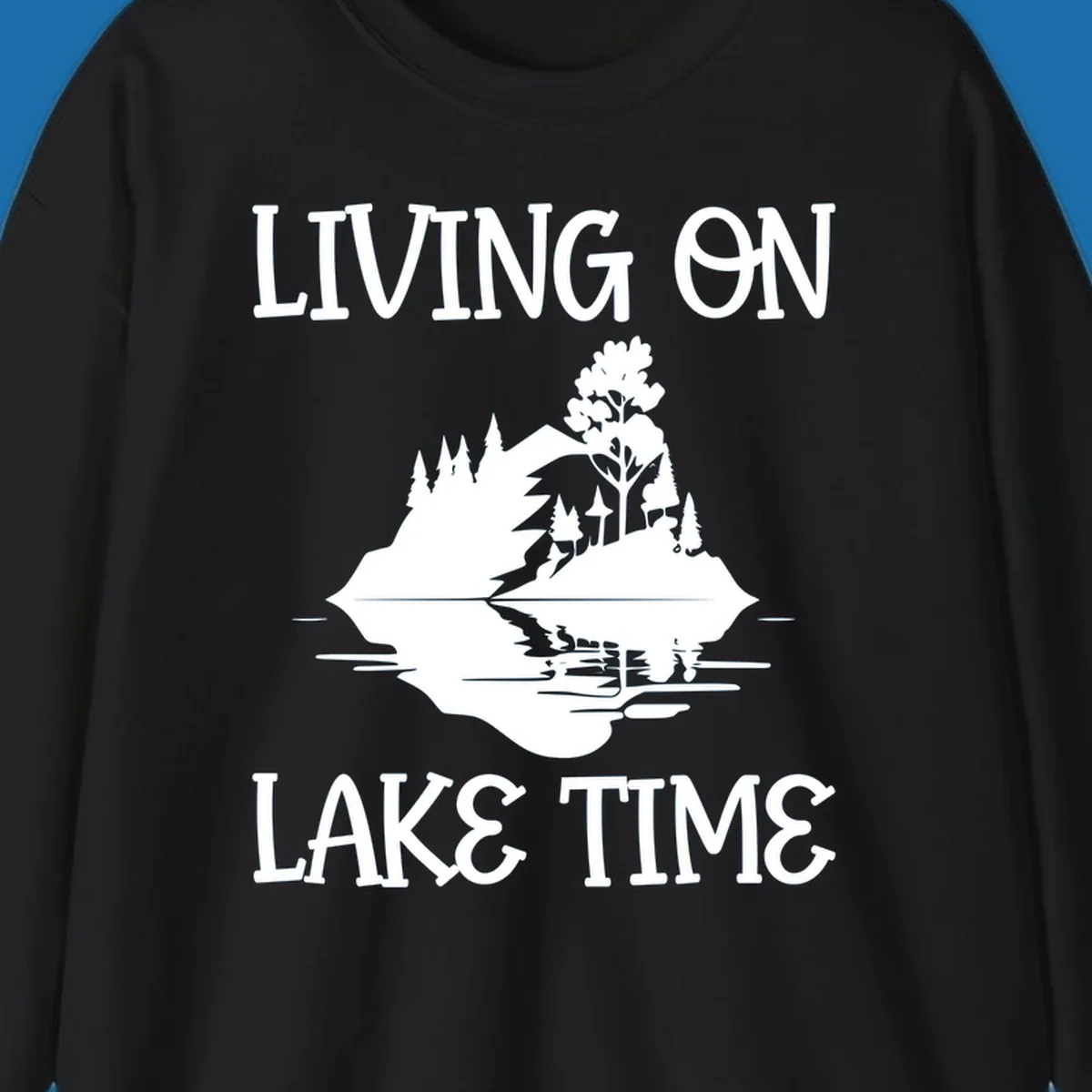 Living on lake time design with island trees mountains and water reflection.