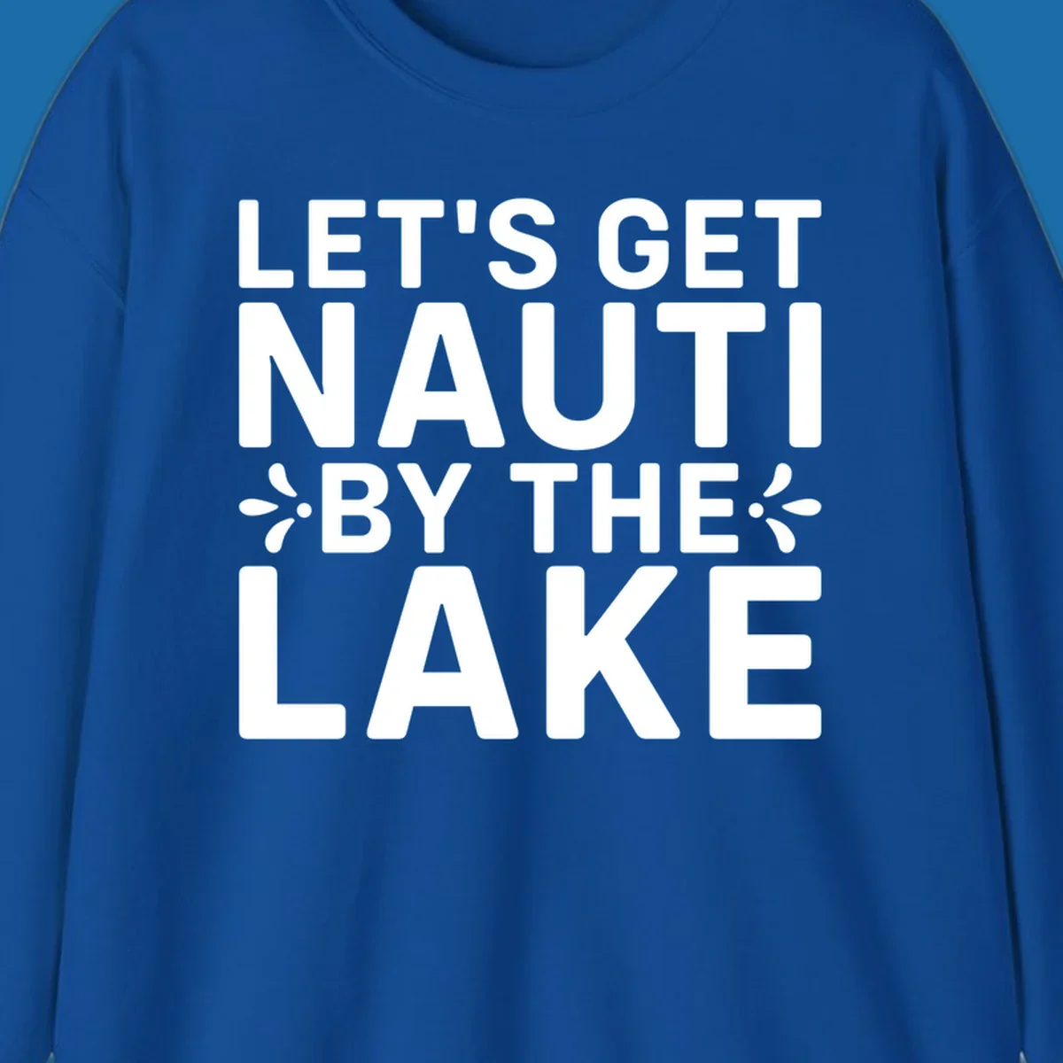 Let's Get Nauti By The Lake text design with decorative splashes.