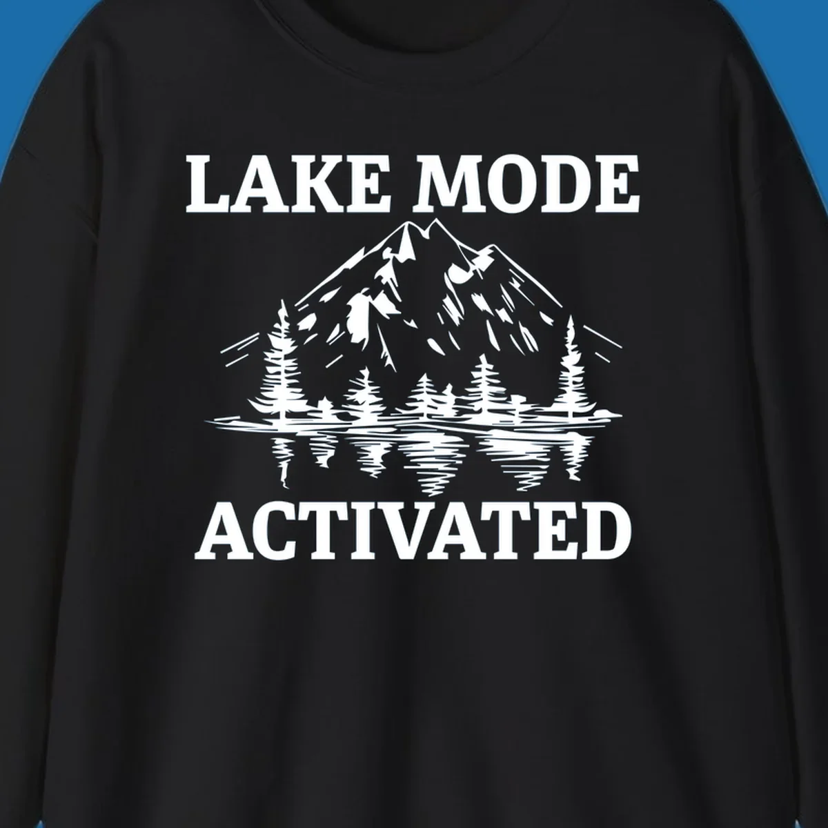 Lake Mode Activated text with mountain, pine trees, and lake reflection graphic.
