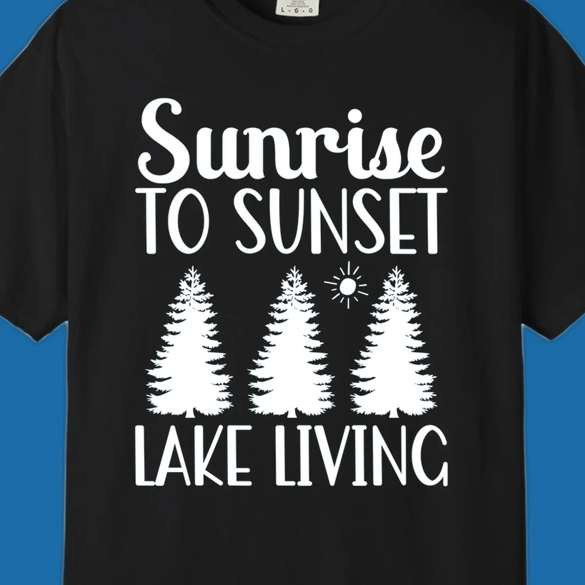 Sunrise to sunset lake living text with pine trees and sun graphic. lake-living-sunrise-sunset