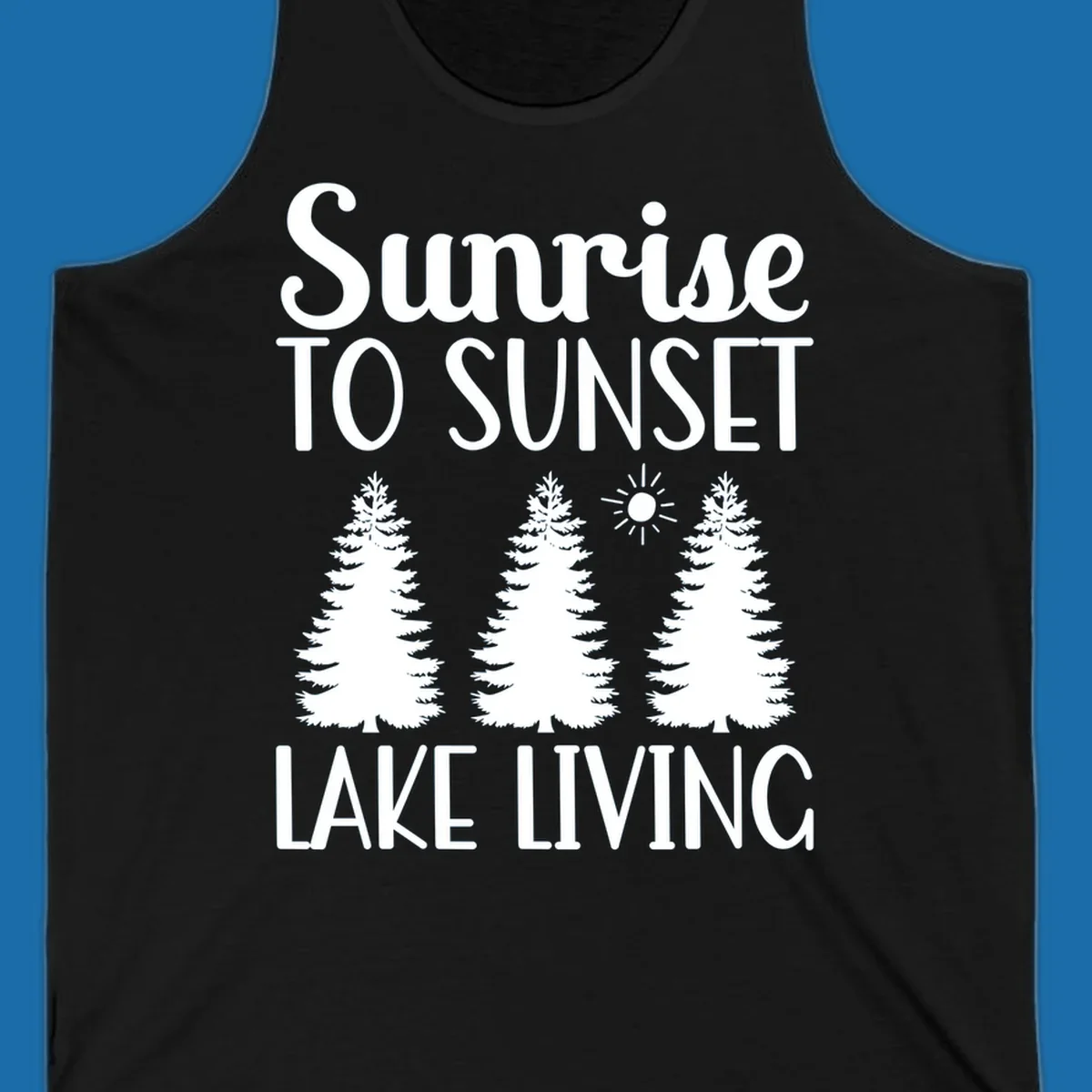 Sunrise to sunset lake living text with pine trees and sun graphic. lake-living-sunrise-sunset