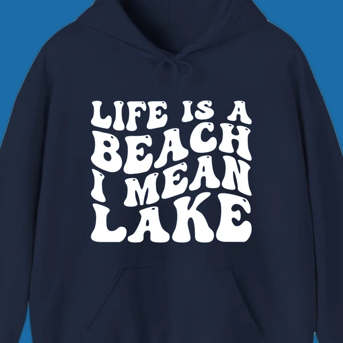 Retro typography design with the phrase "LIFE IS A BEACH I MEAN LAKE" for lake-themed apparel.