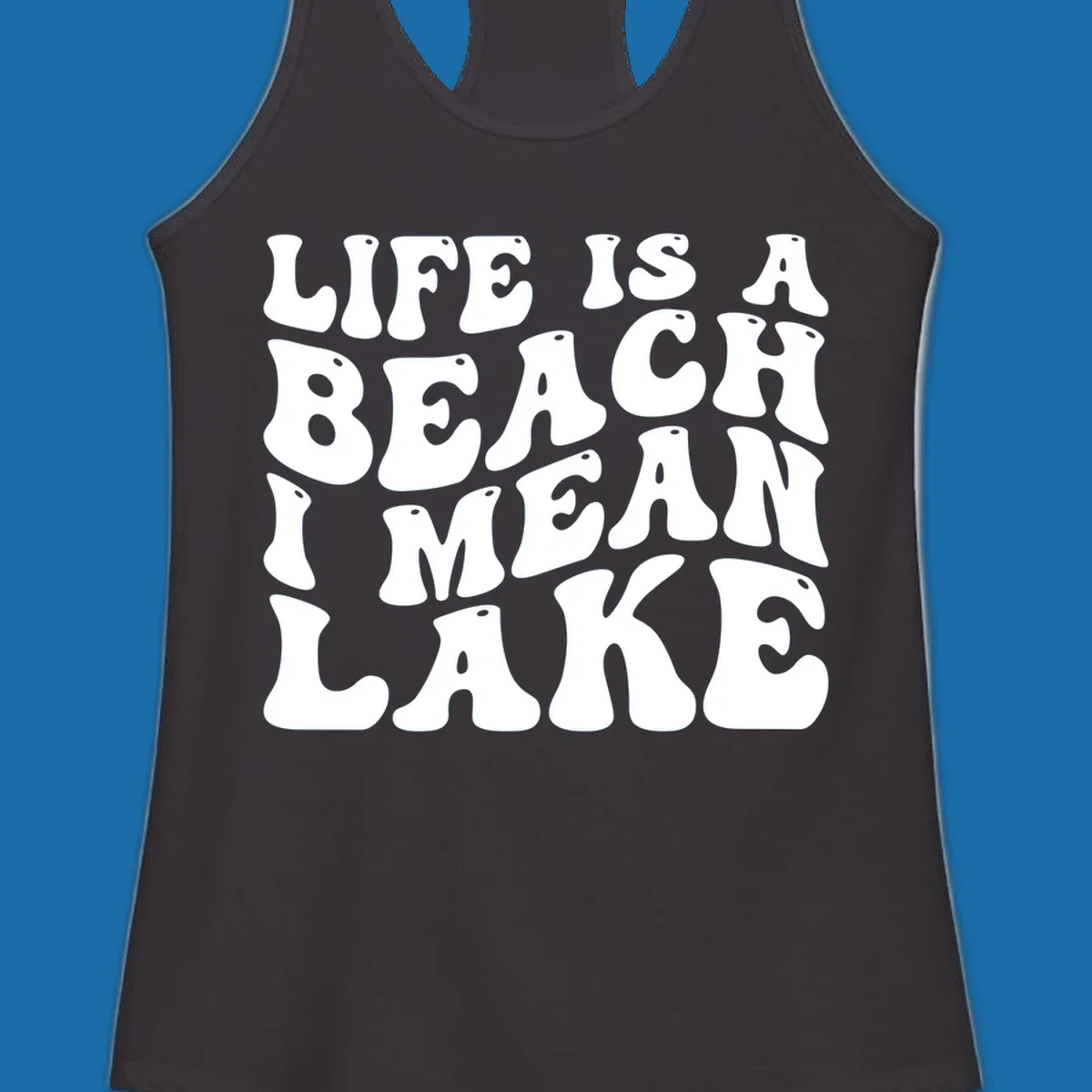 Retro typography design with the phrase "LIFE IS A BEACH I MEAN LAKE" for lake-themed apparel.