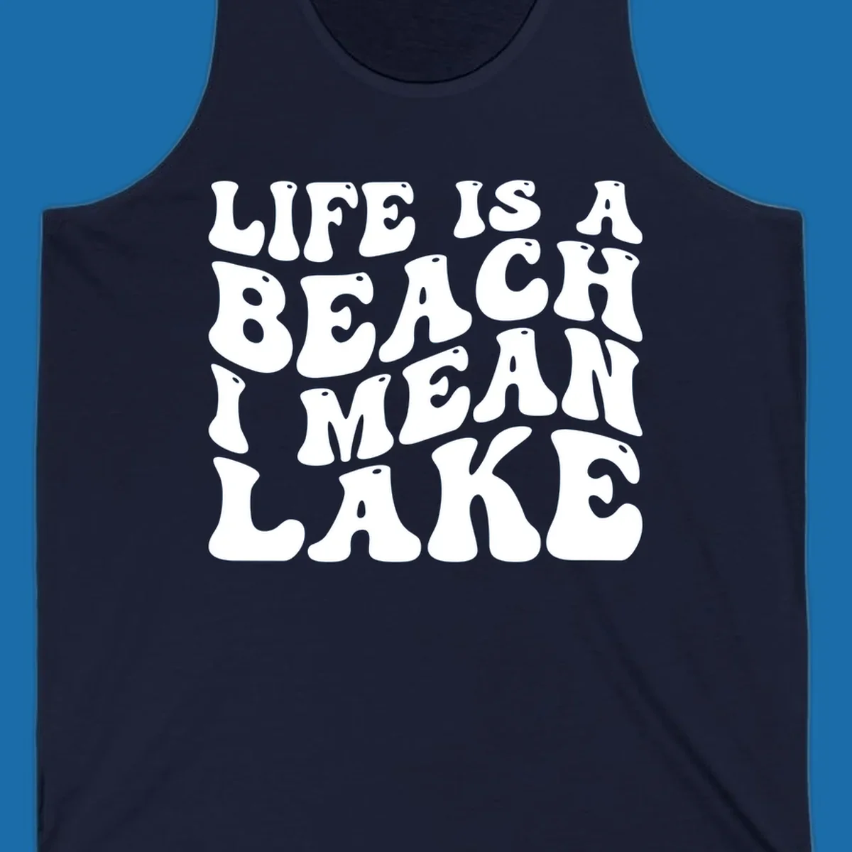 Retro typography design with the phrase "LIFE IS A BEACH I MEAN LAKE" for lake-themed apparel.