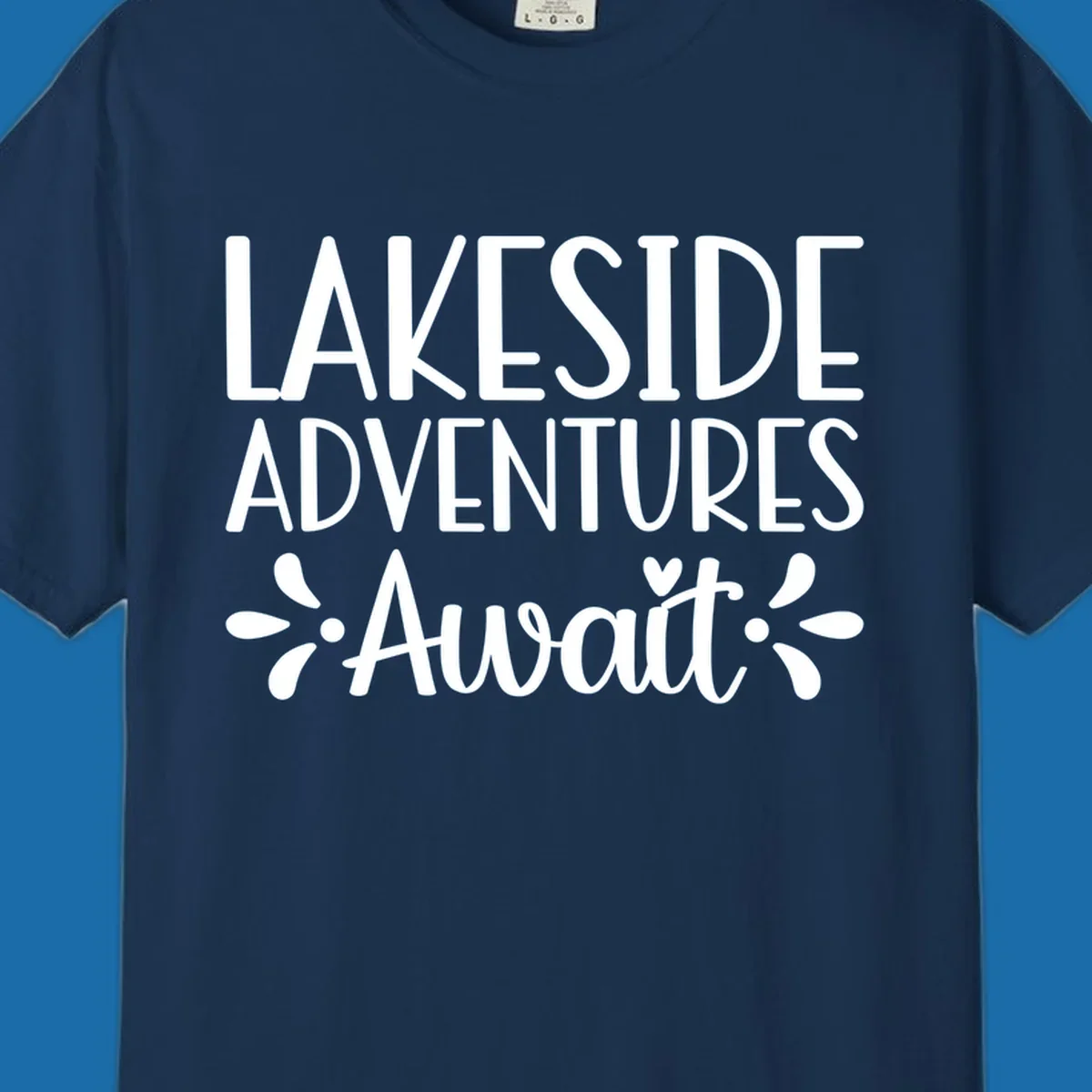 Lakeside adventures await text design with floral accents and a heart.