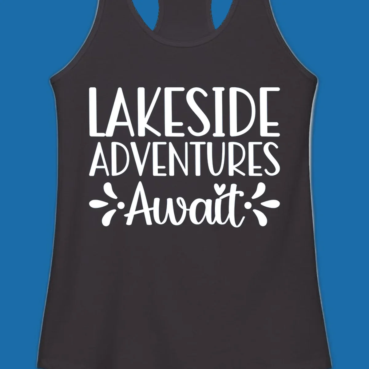 Lakeside adventures await text design with floral accents and a heart.