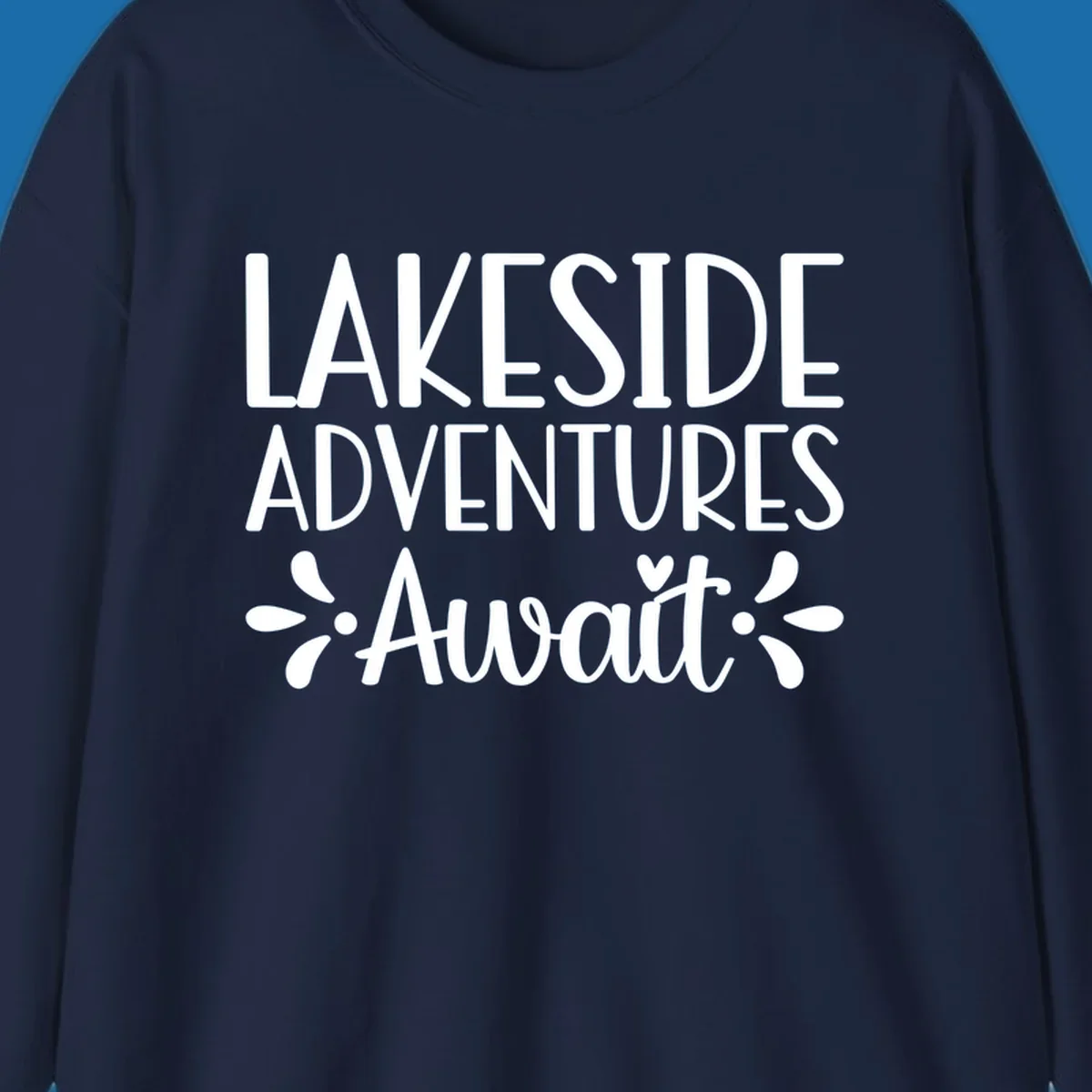 Lakeside adventures await text design with floral accents and a heart.