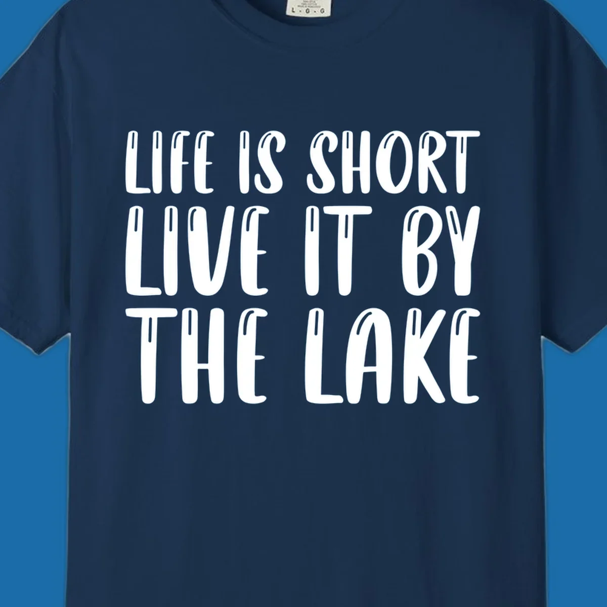 Bold white text "Life Is Short Live It By The Lake" for live-by-the-lake shirt.
