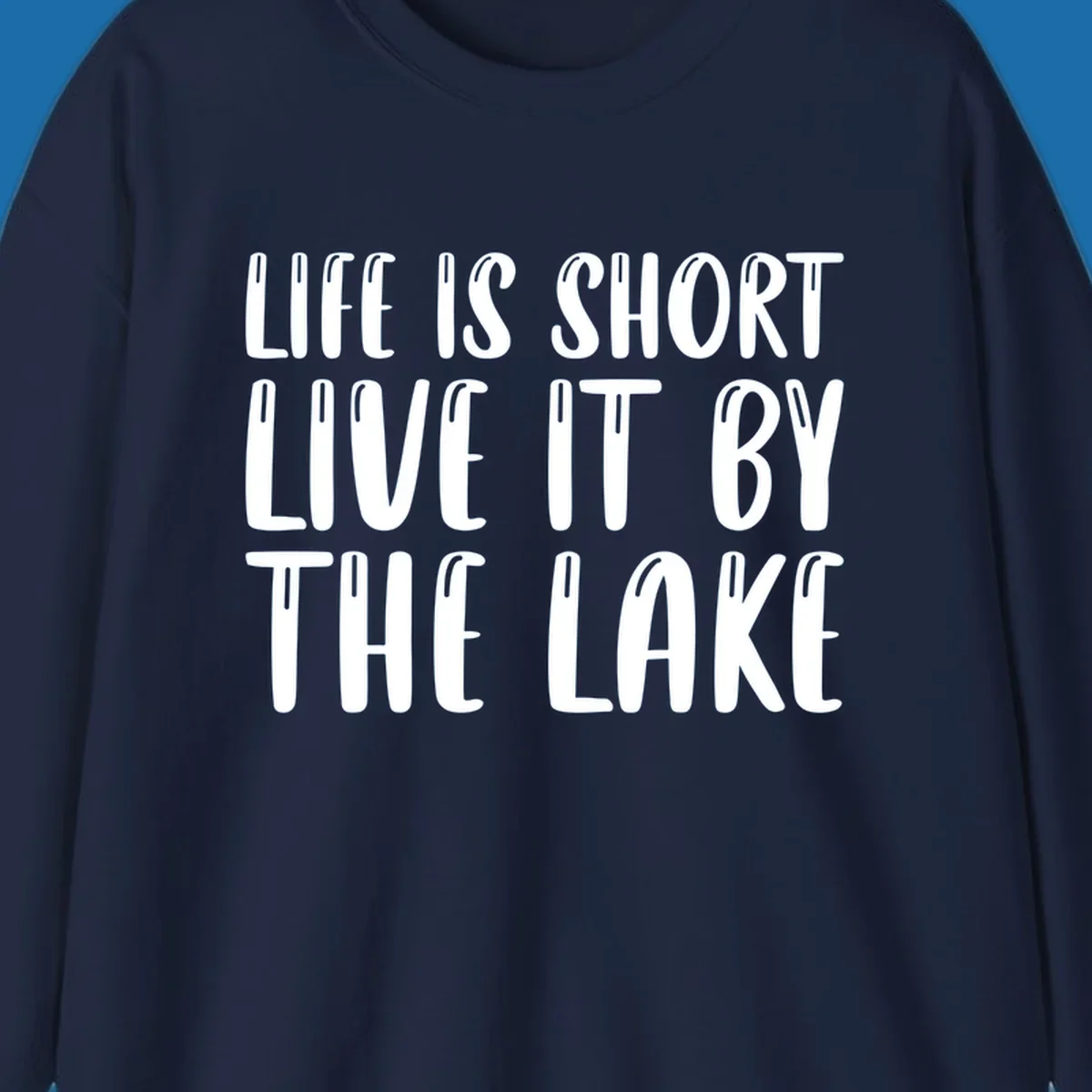 Bold white text "Life Is Short Live It By The Lake" for live-by-the-lake shirt.