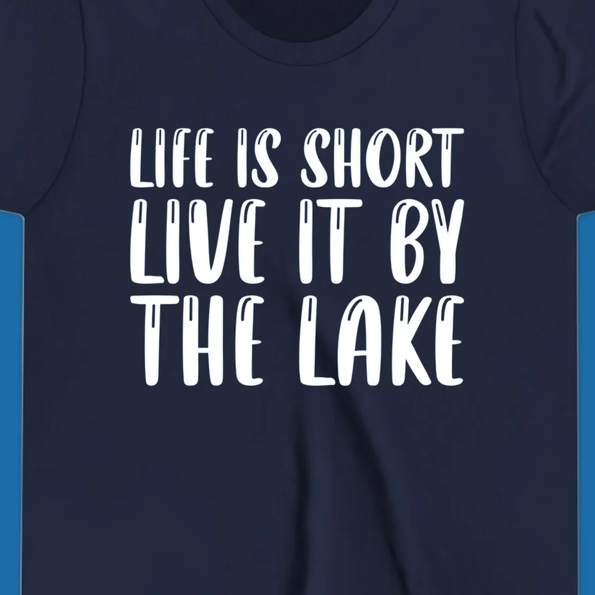 Bold white text "Life Is Short Live It By The Lake" for live-by-the-lake shirt.
