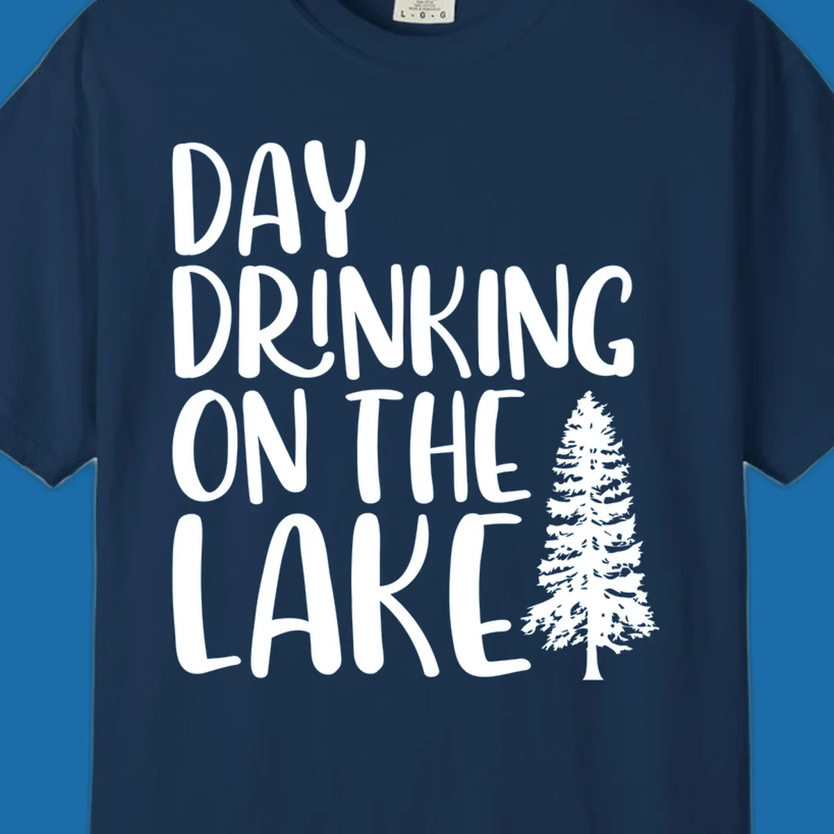 Day Drinking On The Lake graphic with text and a pine tree.