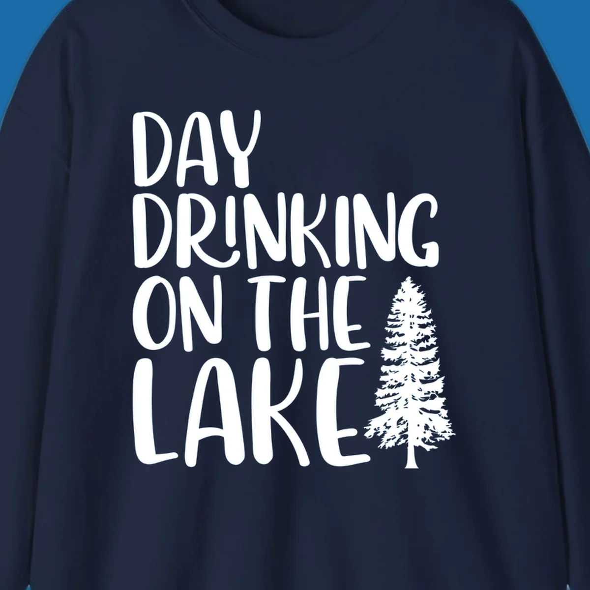 Day Drinking On The Lake graphic with text and a pine tree.