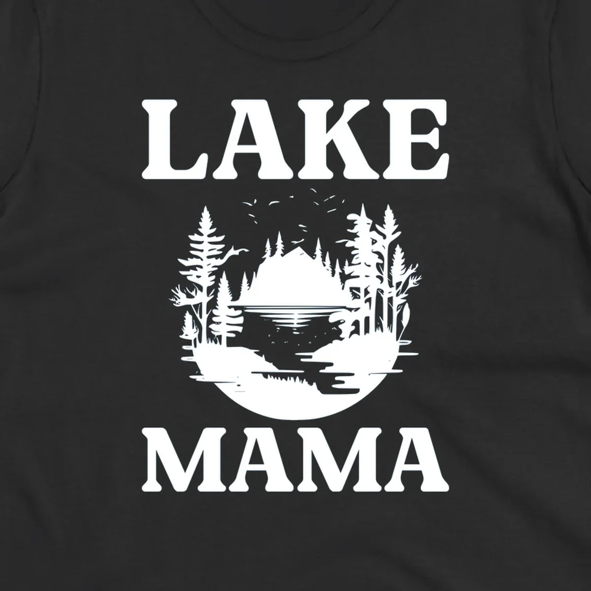Lake Mama nature scene with trees, lake, and mountains silhouette.