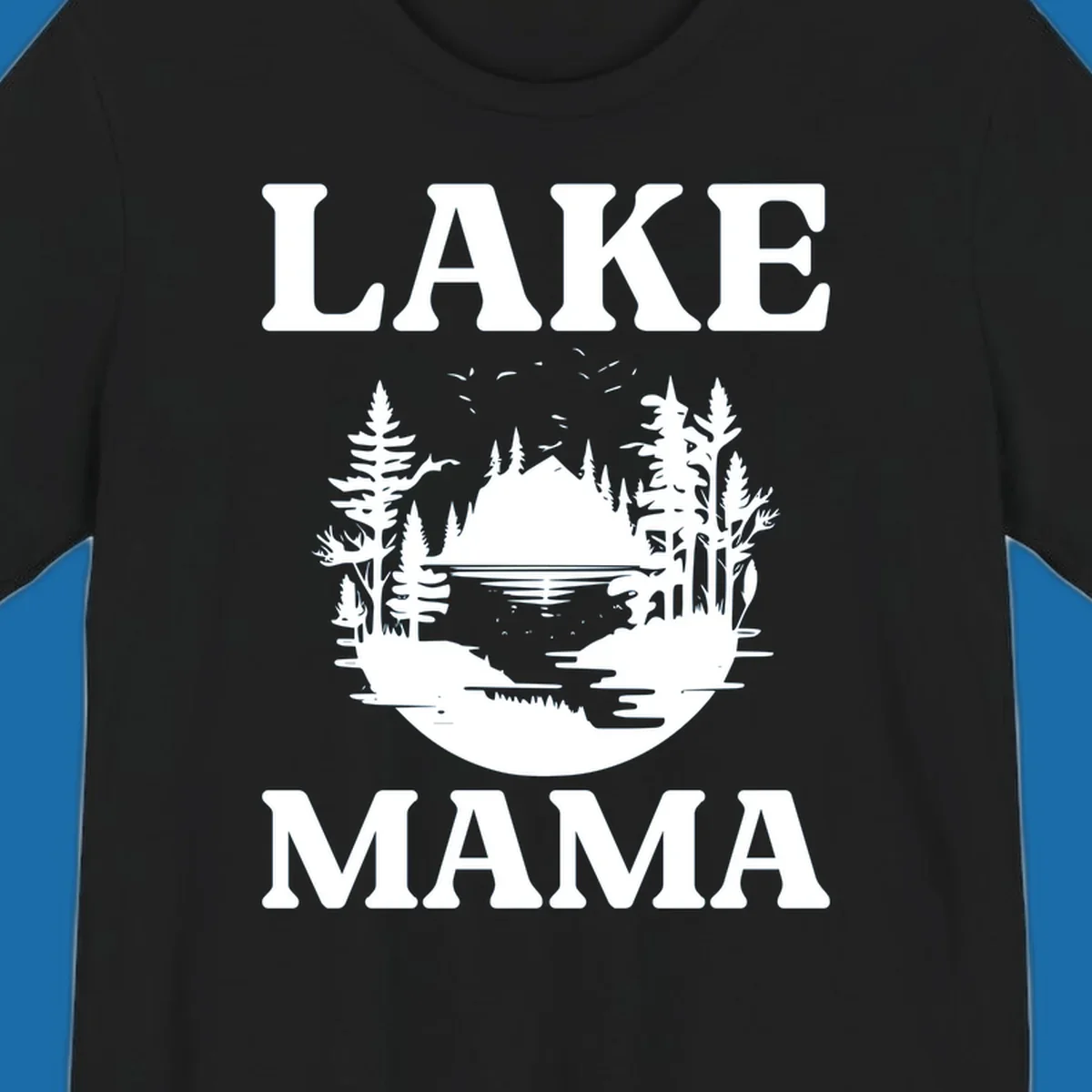 Lake Mama nature scene with trees, lake, and mountains silhouette.