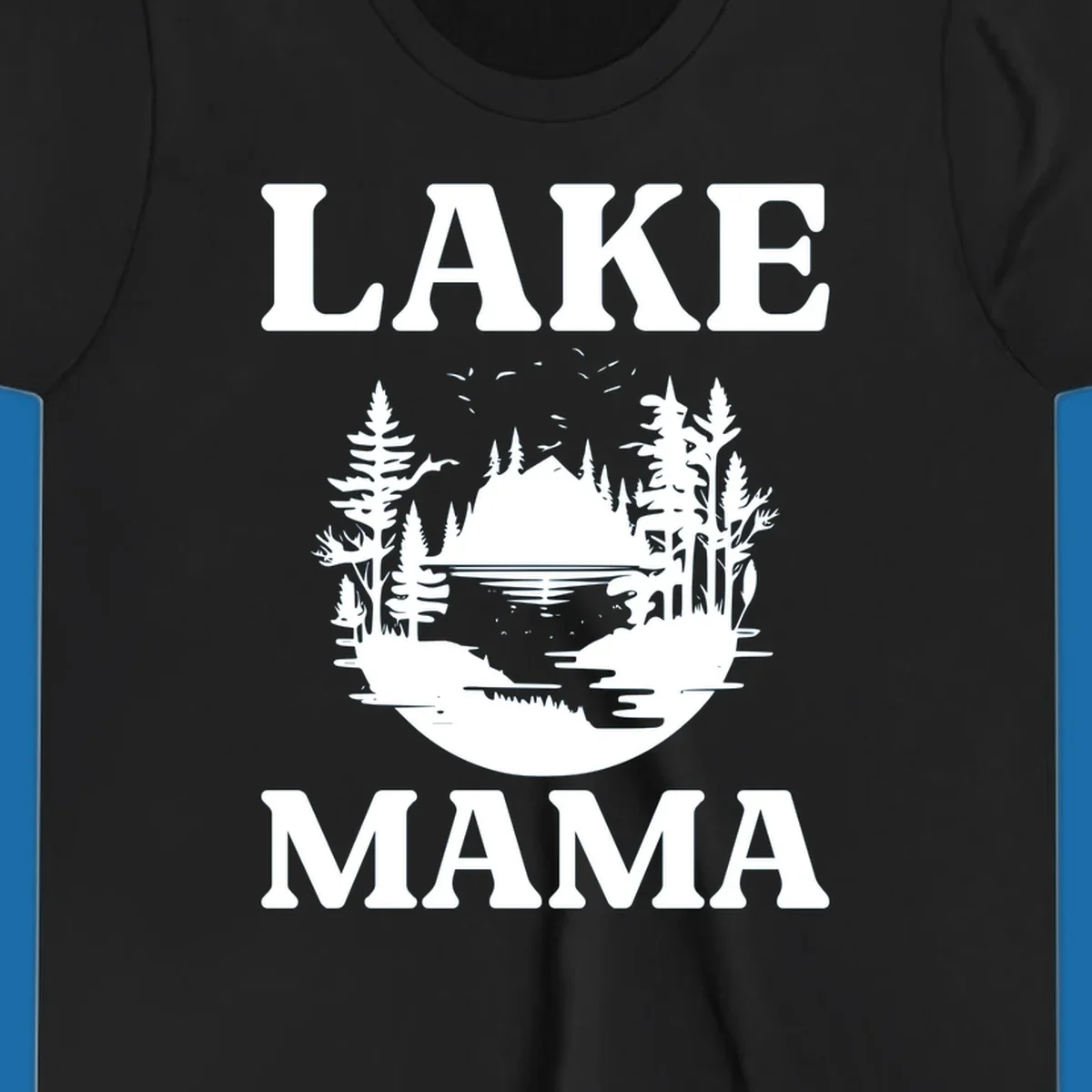 Lake Mama nature scene with trees, lake, and mountains silhouette.