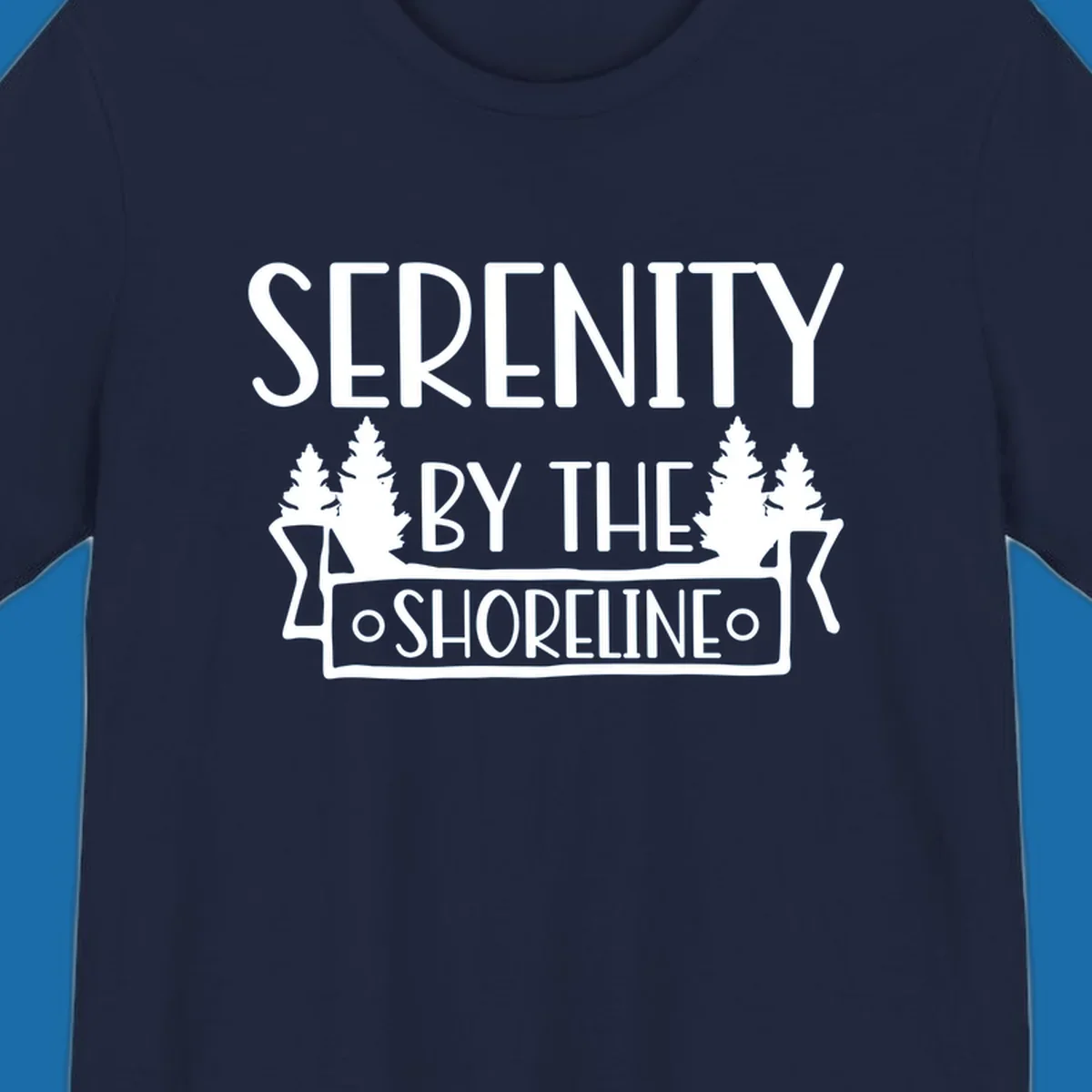 Serenity By The Shoreline text with pine trees and banner